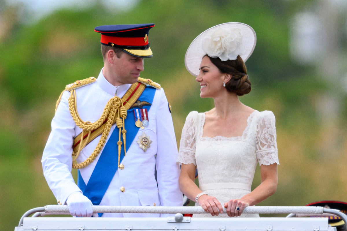 Prince William and Kate Middleton ride in a Land Rover as they attend the inaugural Commissioning Parade for service personnel from across the Caribbean at the Jamaica Defence Force on day six of the Platinum Jubilee Royal Tour of the Caribbean on March 24, 2022