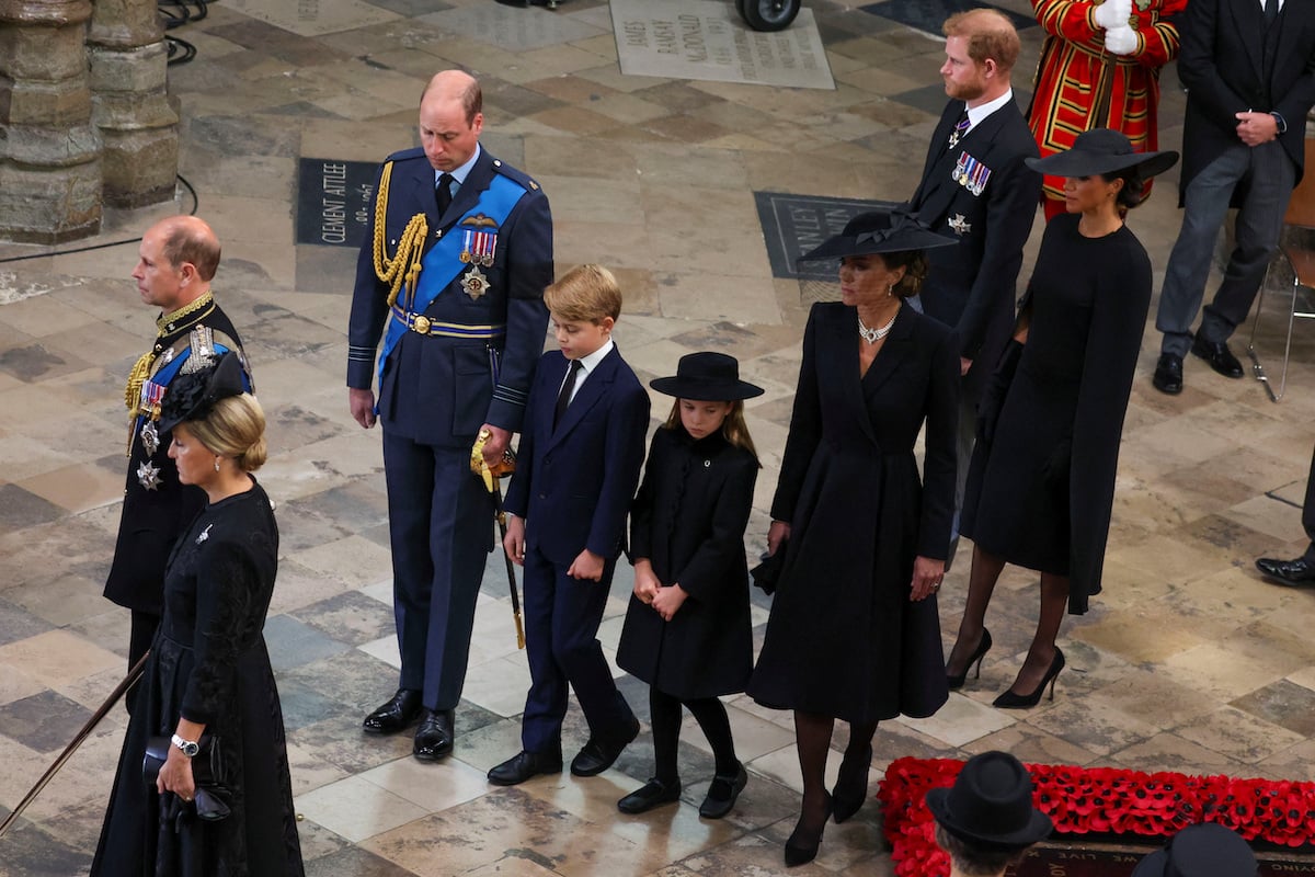 Prince William and Kate Middleton, who looked to Prince George and Princess Charlotte for support at Queen Elizabeth's funeral, walk with Prince George and Princess Charlotte at Queen Elizabeth's funeral at Westminster Abbey
