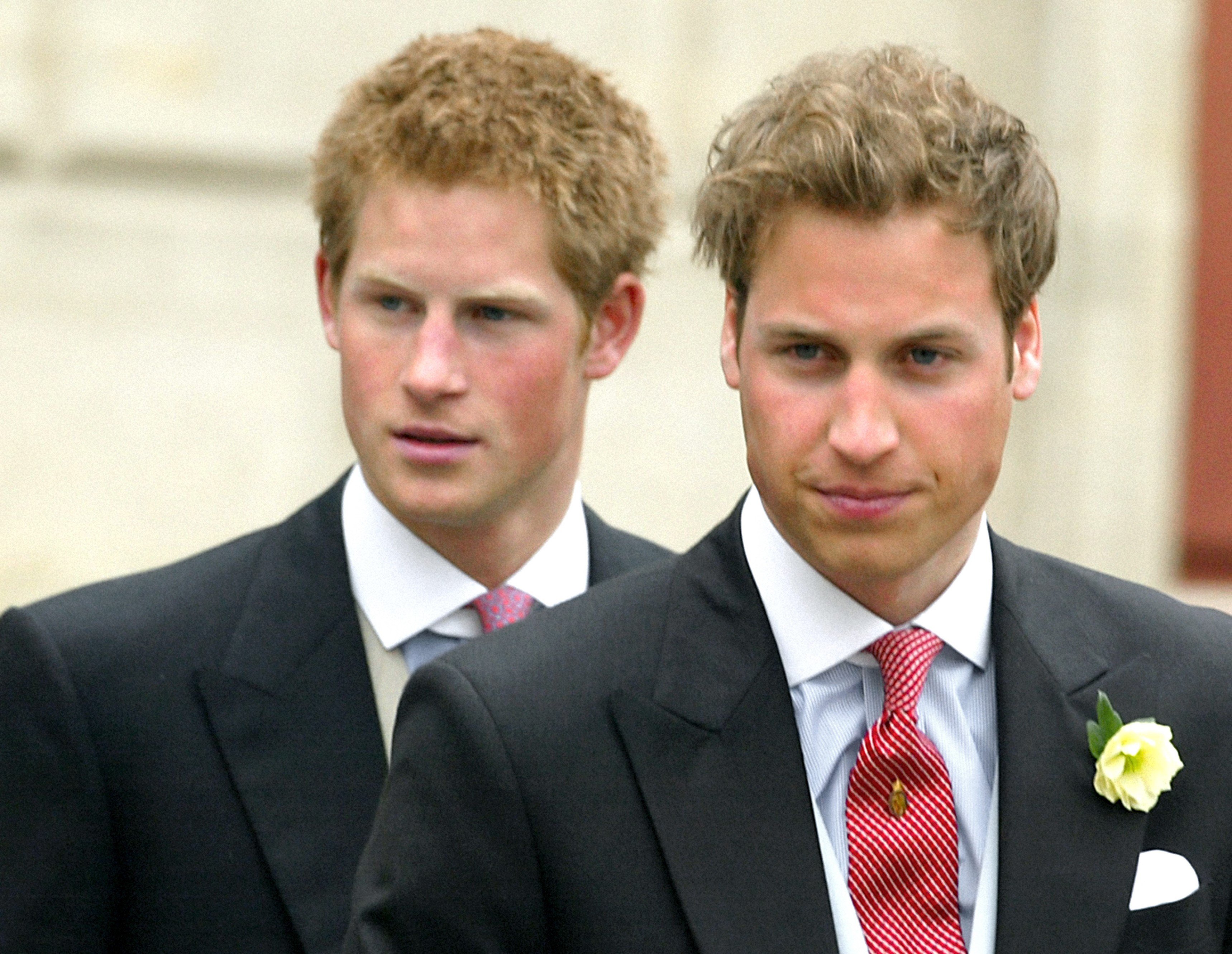 Prince William and Prince Harry leave the civil wedding after their father, Prince Charles, married Camilla Parker Bowles