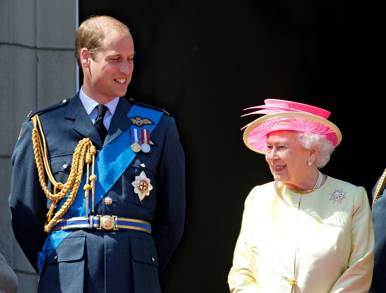 Prince William and Queen Elizabeth II watch a flypast in 2015