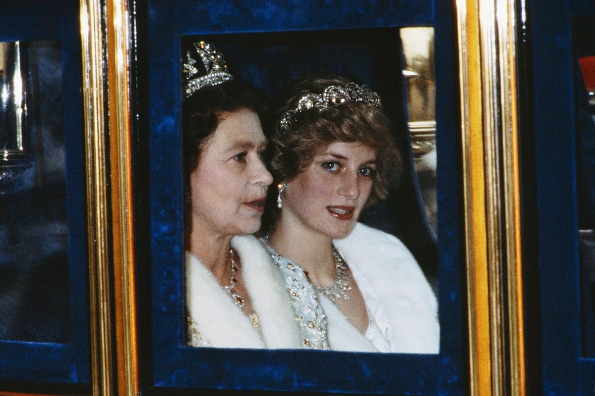 Princess Diana and Queen Elizabeth II in a carriage headed to the Opening of Parliament in London
