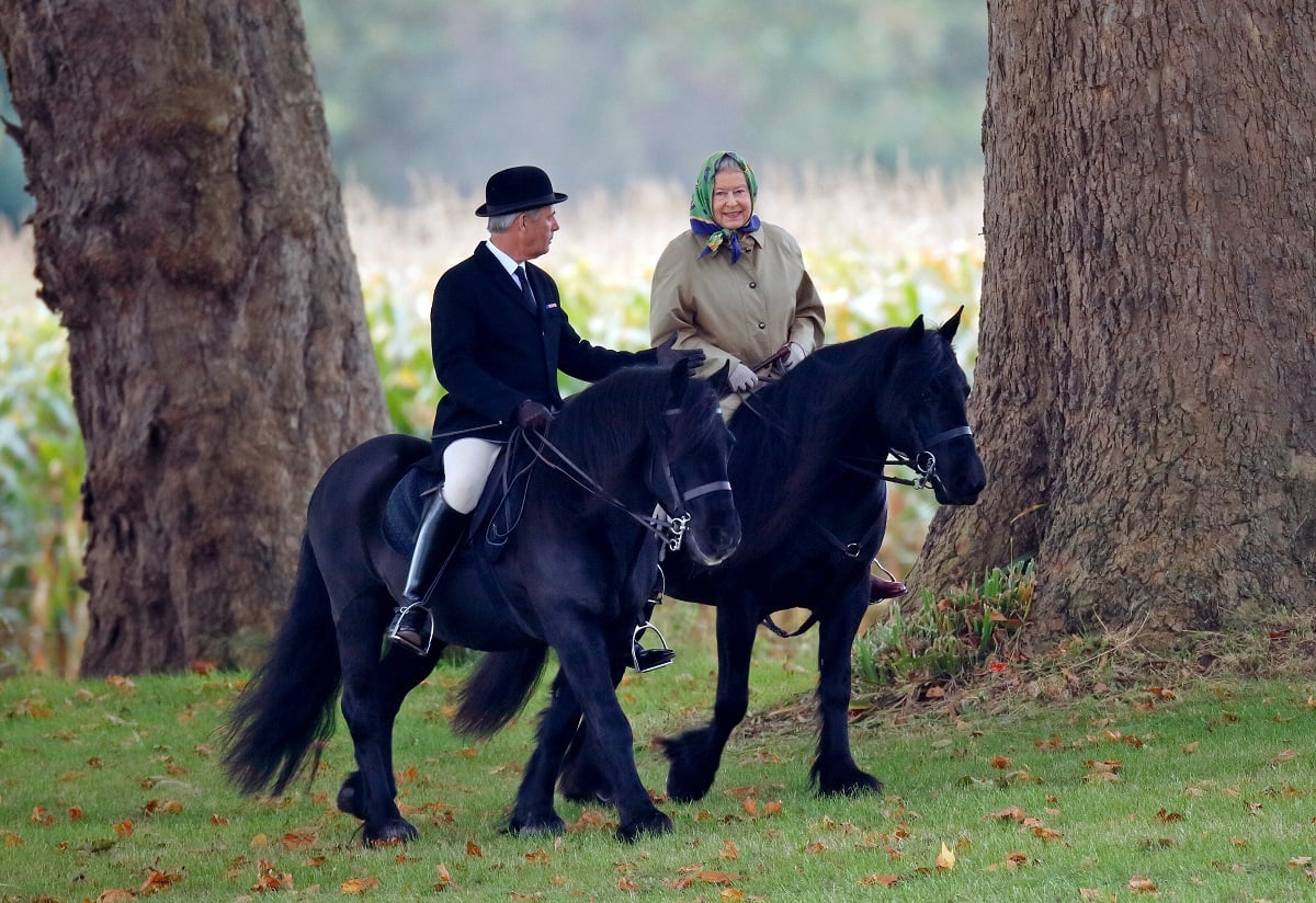 Queen Elizabeth II, who's pony Emma who may go to live with Princess Anne and Zara, is seen riding with her her Stud Groom Terry Pendry at Windsor