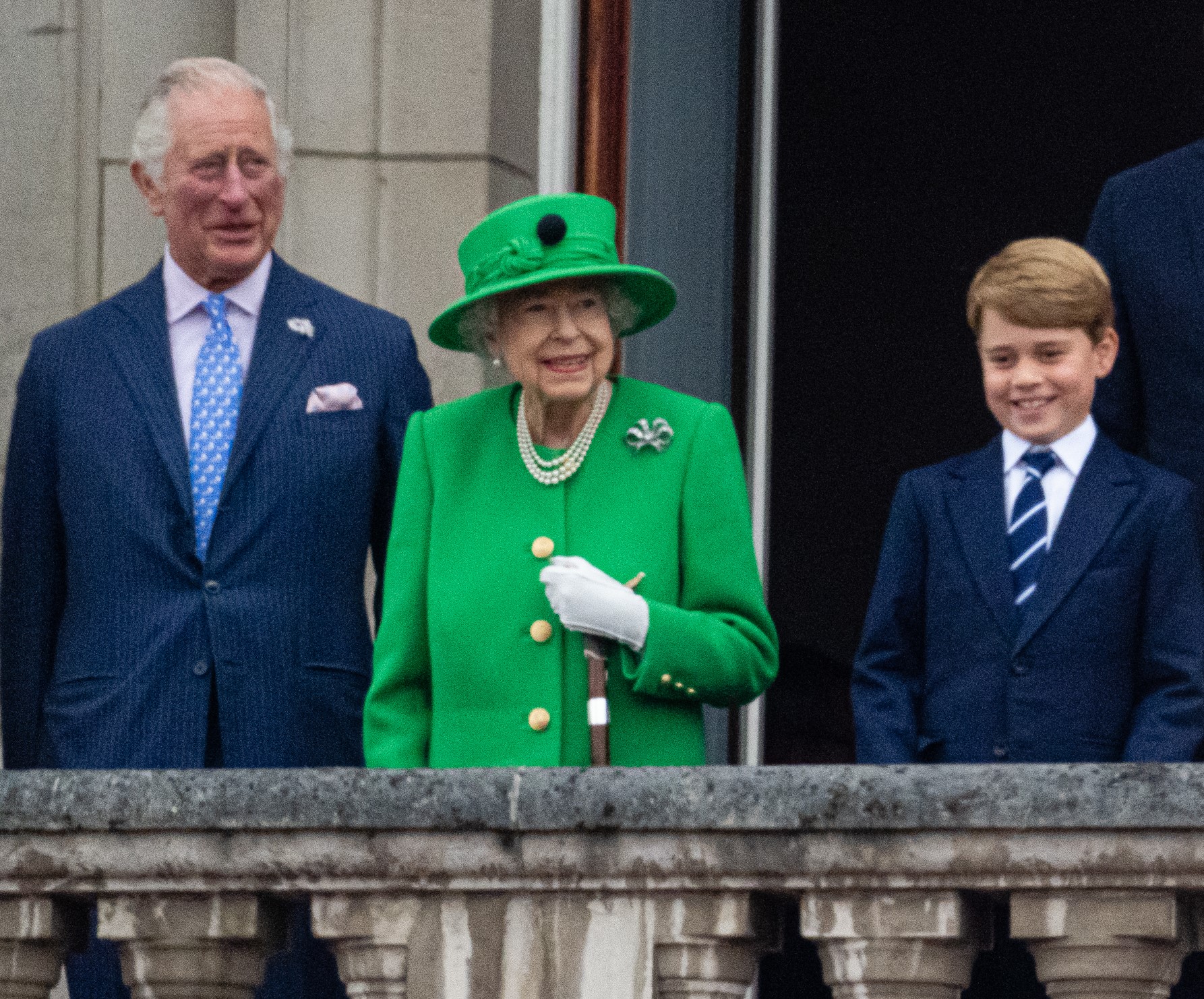 Queen Elizabeth II, then-Prince Charles, and Prince George on the balcony of Buckingham Palace during the Platinum Jubilee Pageant