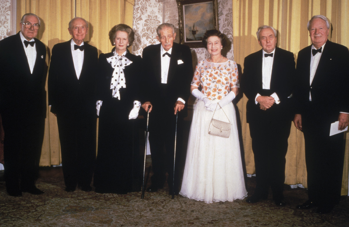 Queen Elizabeth, whose reign appears in photos, stands with prime ministers in 1985