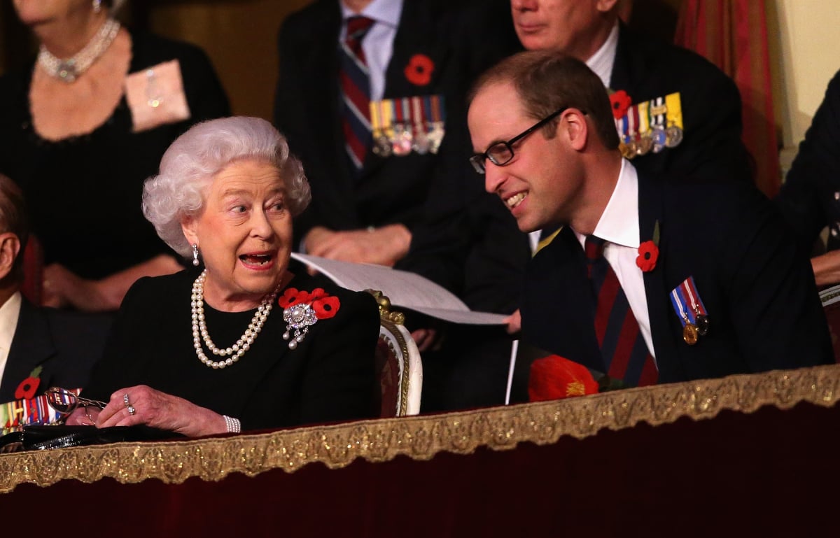 Queen Elizabeth II and Prince William, Duke of Cambridge chat to each other in the Royal Box at the Royal Albert Hall during the Annual Festival of Remembrance on November 7, 2015 in London, England