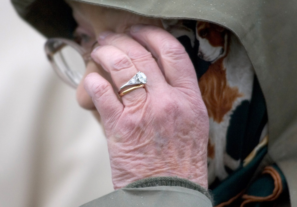 Queen Elizabeth gives fans a glimpse of her engagement ring from Prince Philip as she attends 2007 Windsor Horse Show