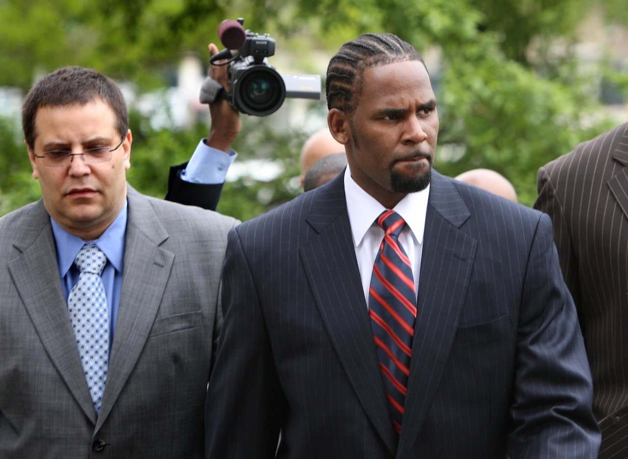 R. Kelly leaving a Chicago courtoom; Kelly has reportedly injured himself in prison
