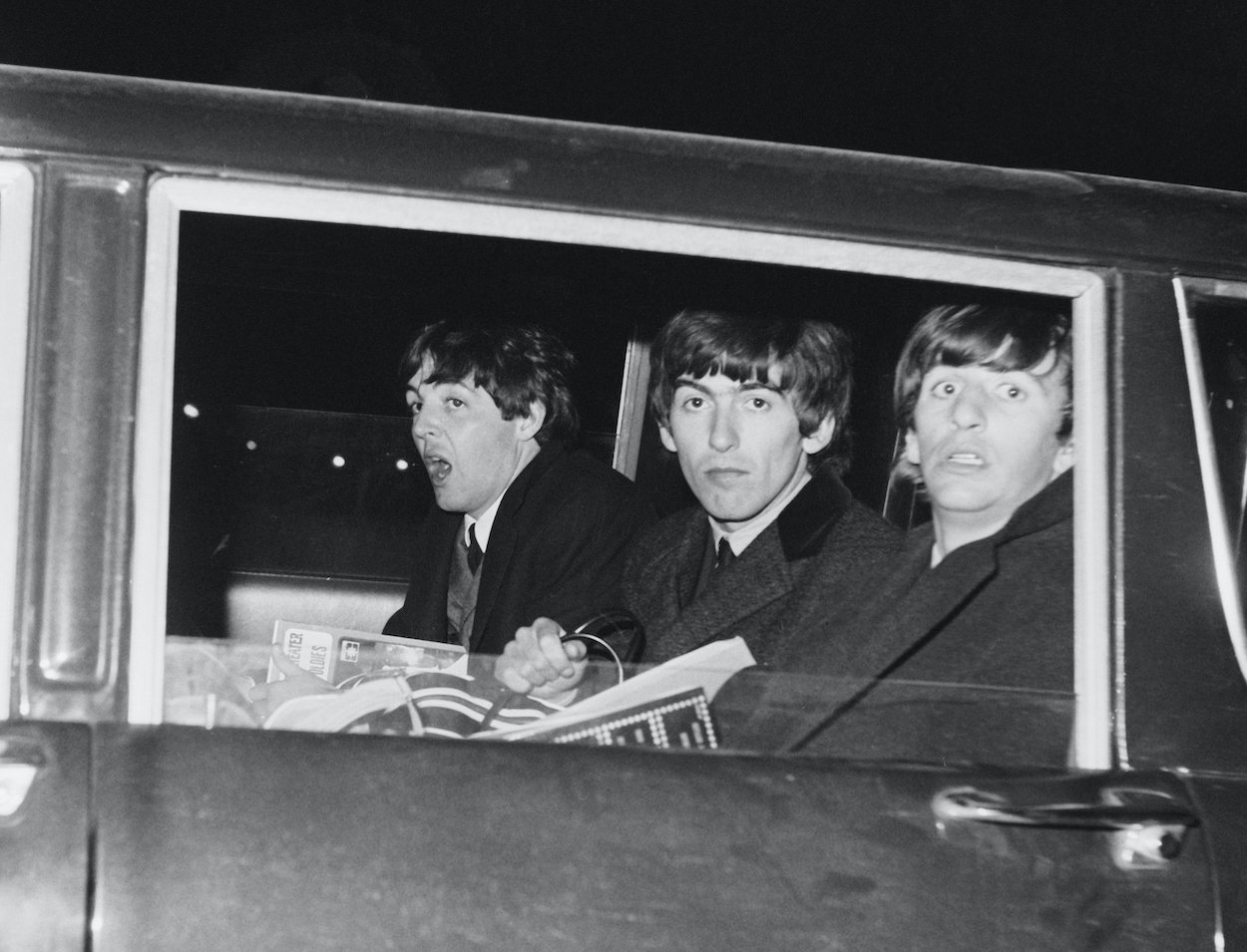 (l-r) Paul McCartney, George Harrison, and Ringo Starr at JFK Airport in 1964, two years after Ringo said Paul and George argued for two hours over car keys.