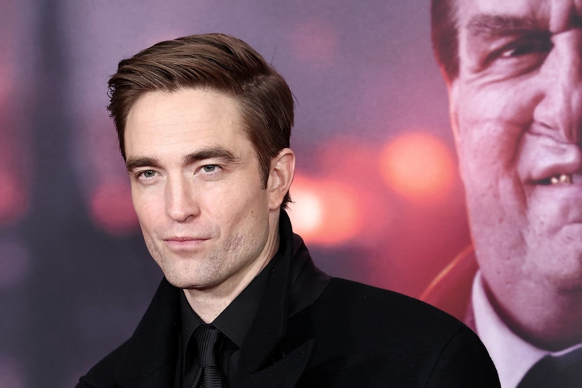 Robert Pattinson posing at 'The Batman' premiere.