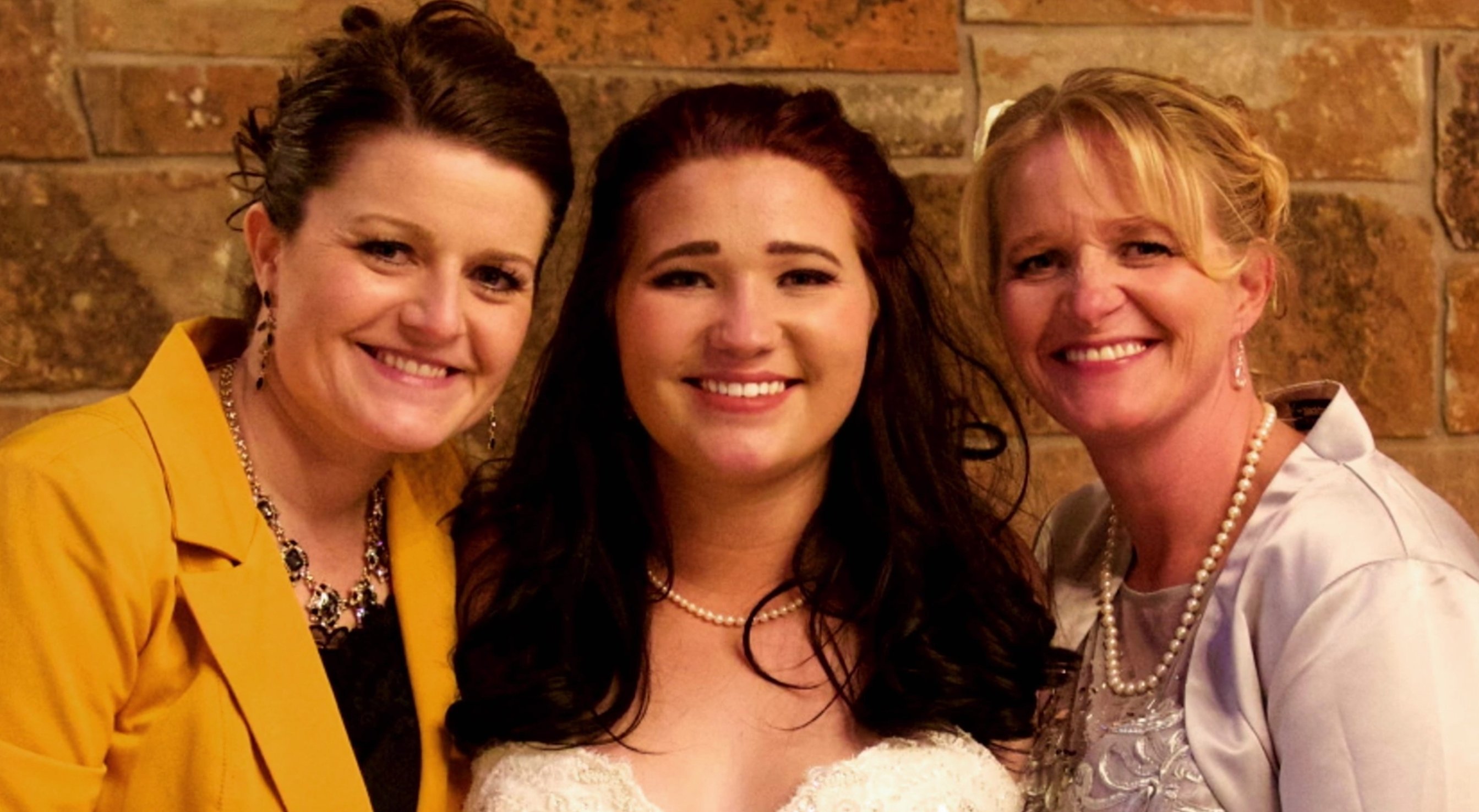 Robyn Brown and Christine Brown pose with Mykelti Brown on their wedding day to Tony Padron in TLC's Sister Wives.