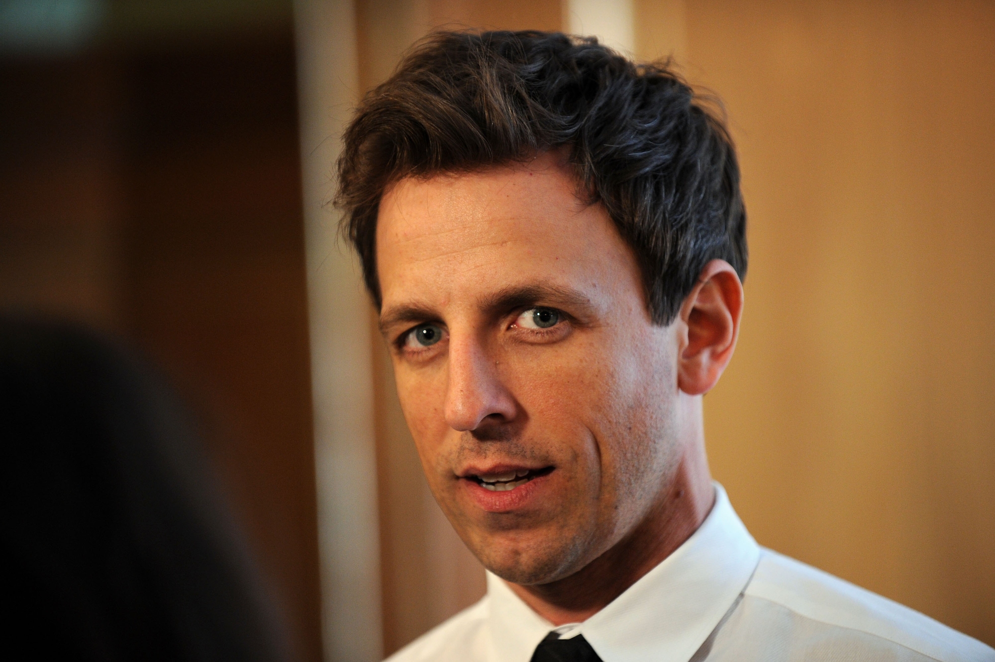 Ex-'Saturday Night Live' head writer Seth Meyers wearing a white-collared shirt