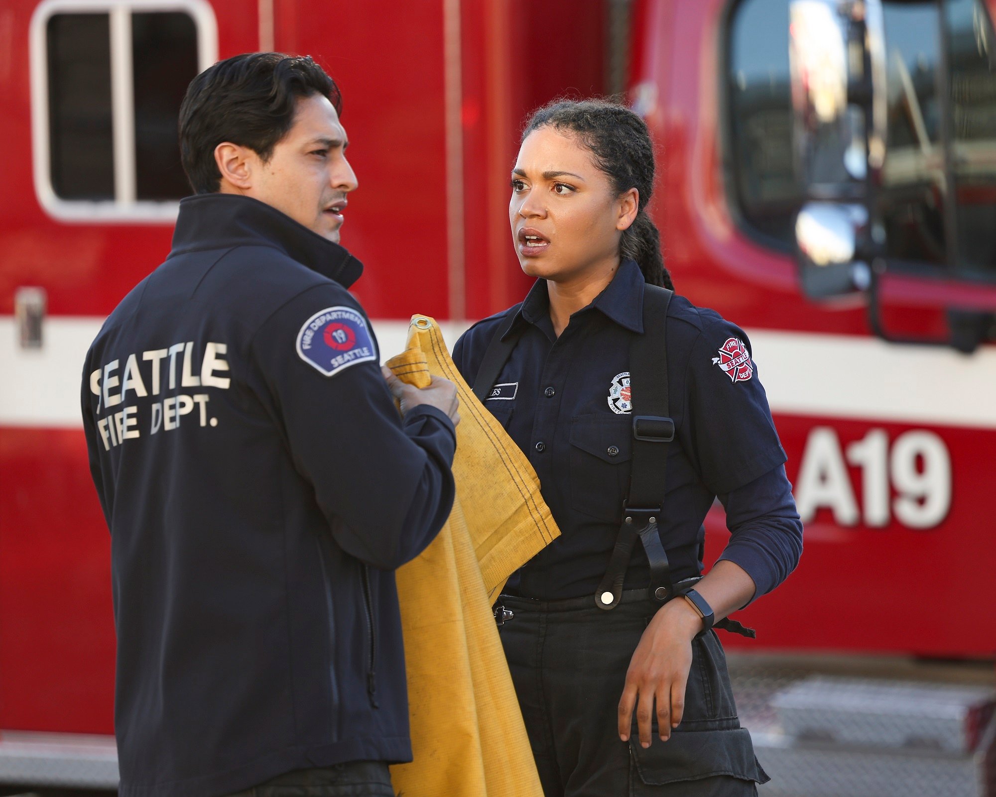 'Station 19' Season 6 cast members Carlos Miranda as Theo Ruiz and Barrett Doss as Vic Hughes