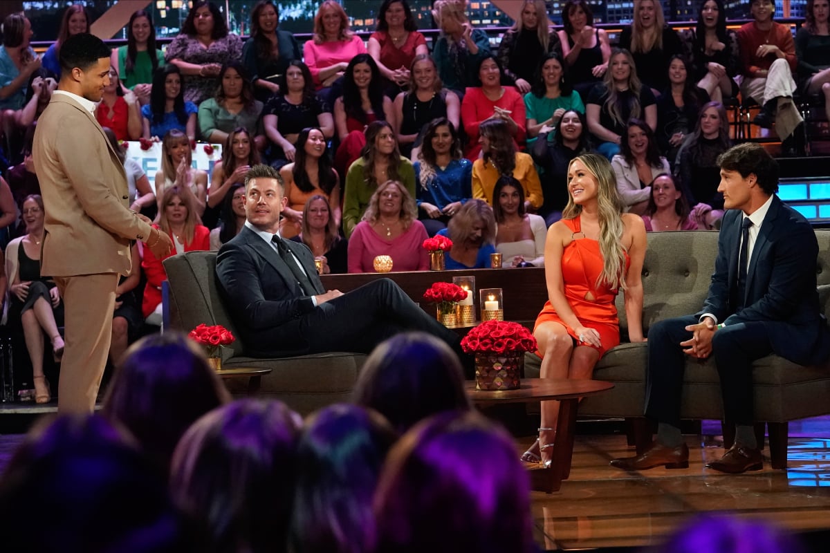 During The Bachelorette 2022 finale, Aven appears on stage next to Jesse, Rachel and Tino, who are sitting down. 