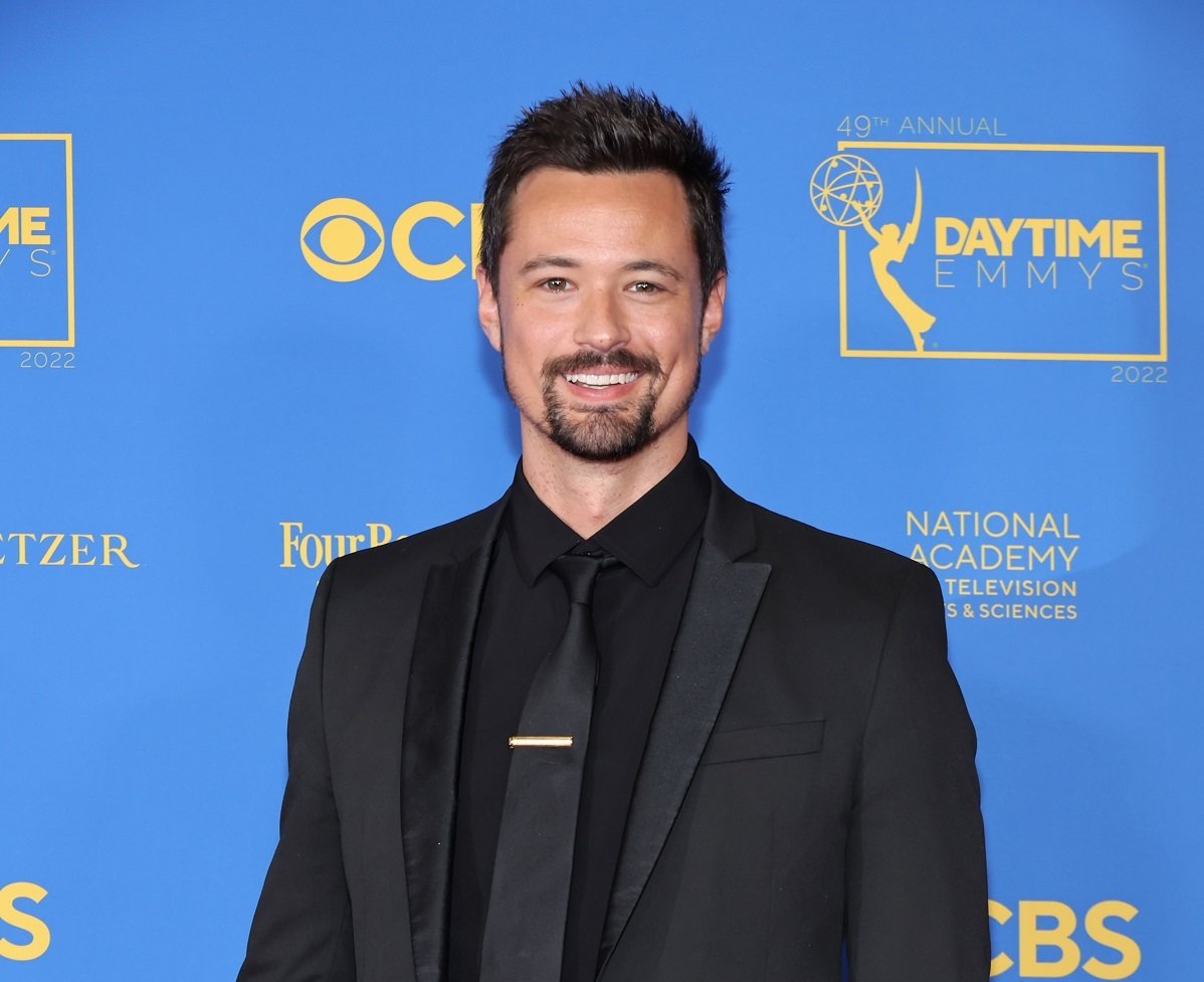 'The Bold and the Beautiful' star Matthew Atkinson wearing a black suit, poses for a photo during he 2022 Daytime Emmys.