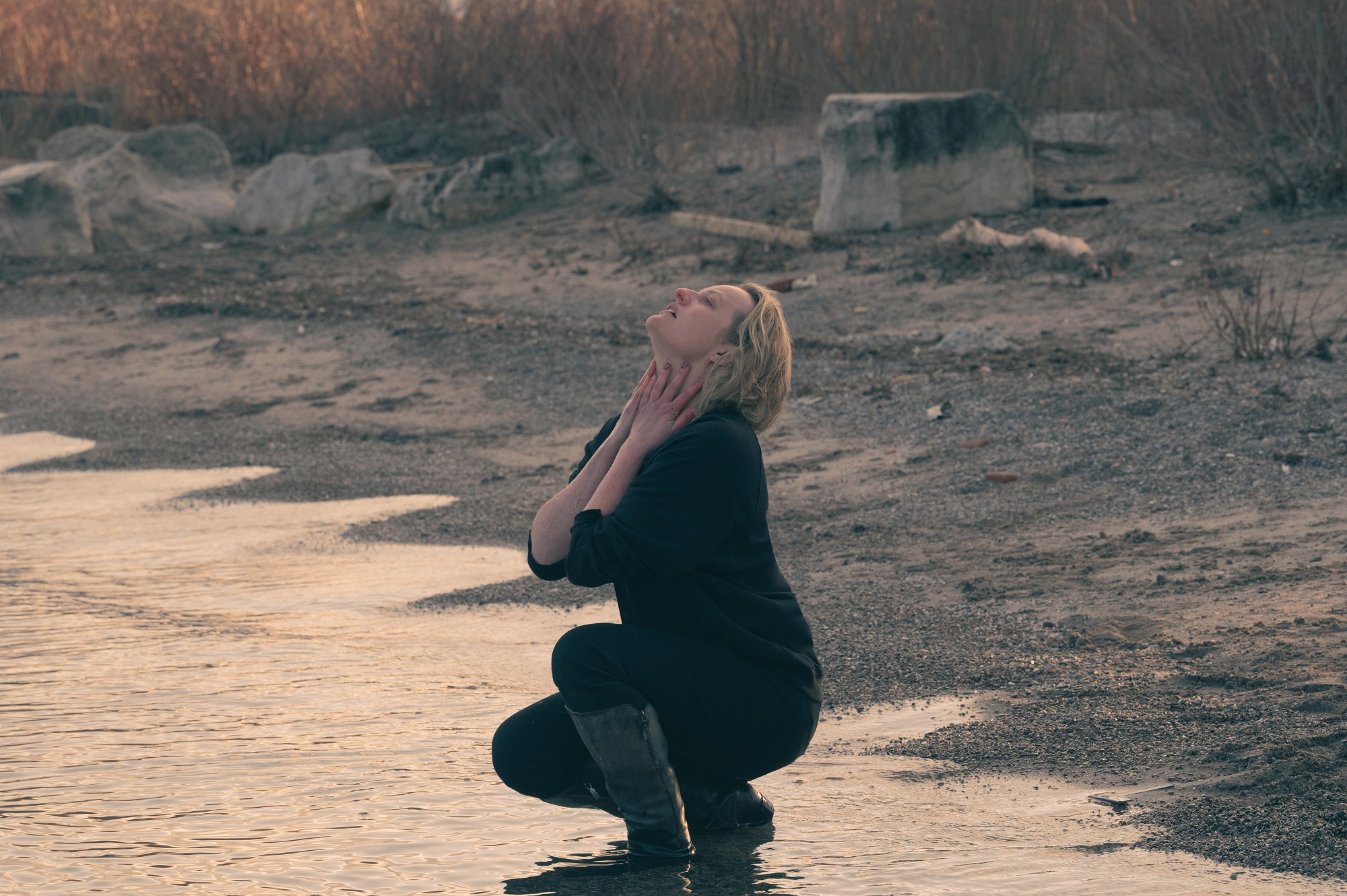 June crouches in water in season 5 of 'The Handmaid's Tale'
