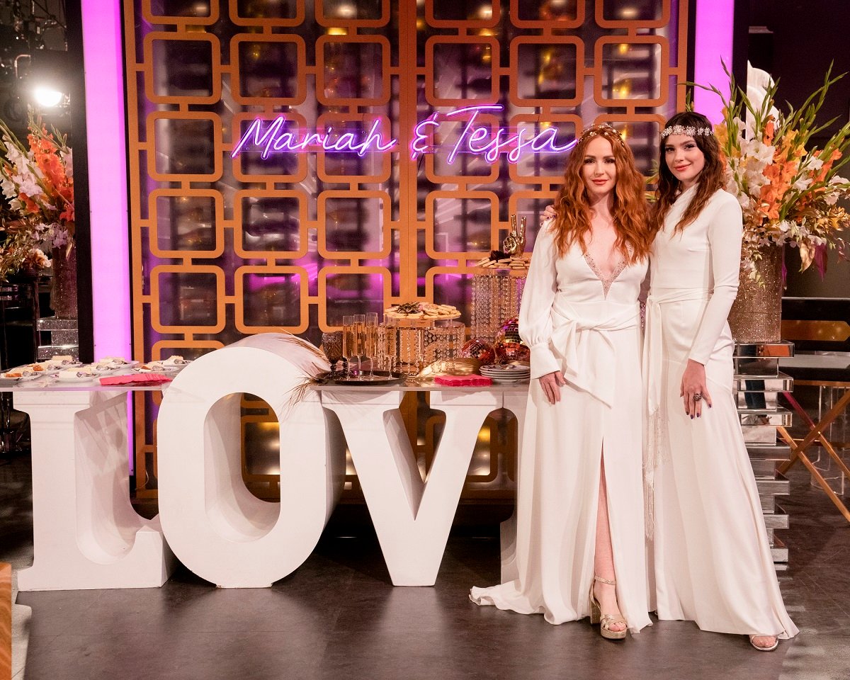 'The Young and the Restless' stars Camryn Grimes and Cait Fairbanks wearing white wedding dresses on set of the CBS soap opera.