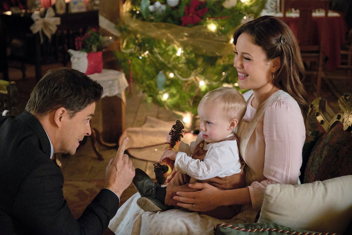 Elizabeth with baby Jack in her lap in 'When Calls the Heart: Home for Christmas'