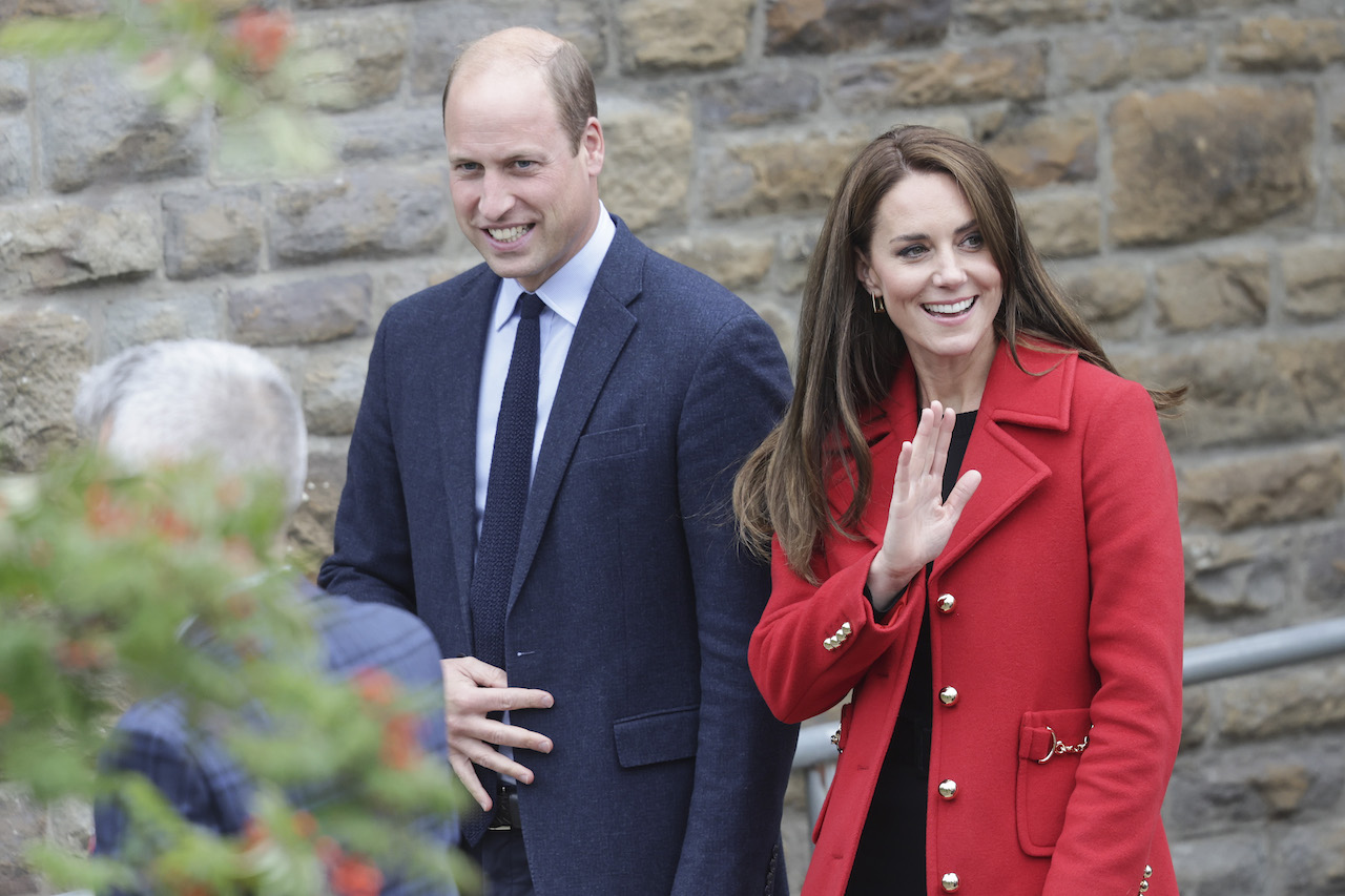 Prince William, Prince of Wales, and Kate Middleton, Princess of Wales leave St Thomas Church, which has been has been redeveloped to provide support to vulnerable people, during their visit to Wales on September 27, 2022, in Swansea, Wales.