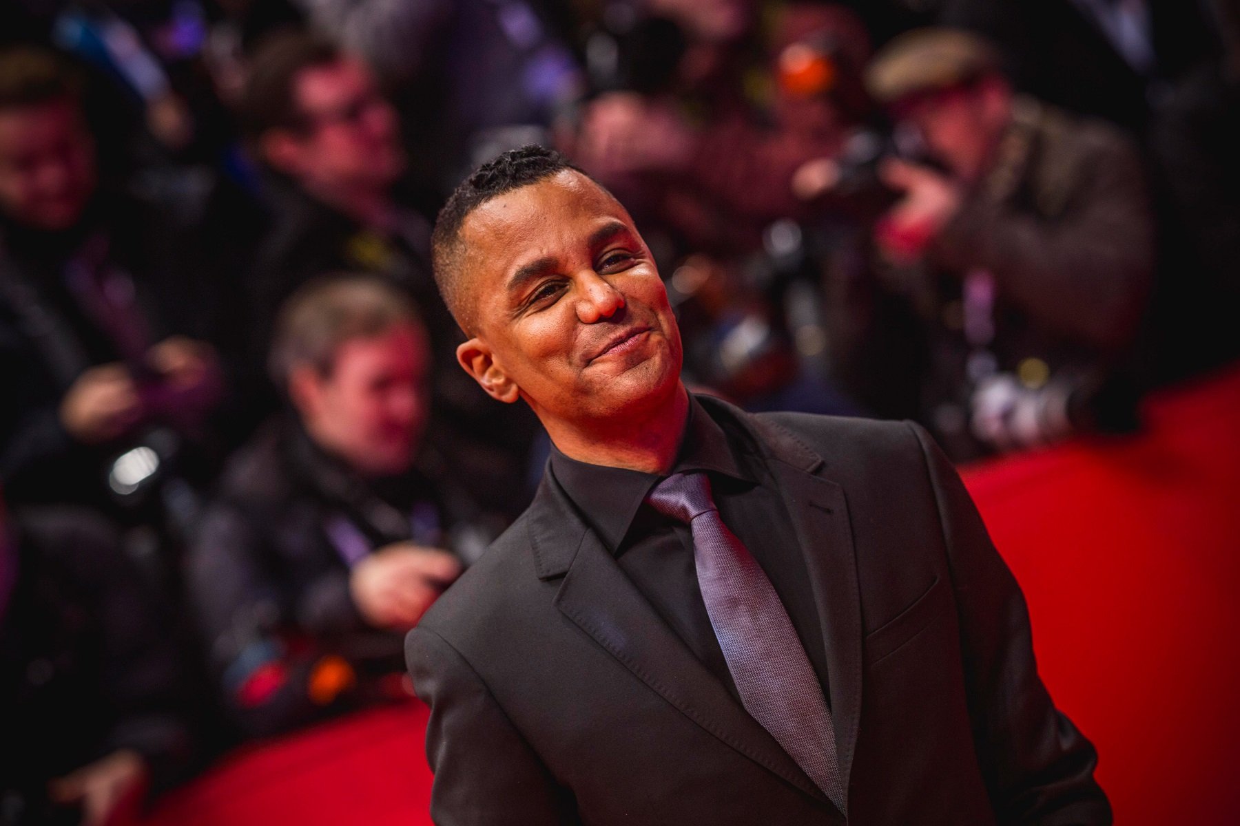 Yanic Truesdale arrives for the opening ceremony and "My Salinger Year" premiere during the 70th Berlinale International Film Festival Berlin