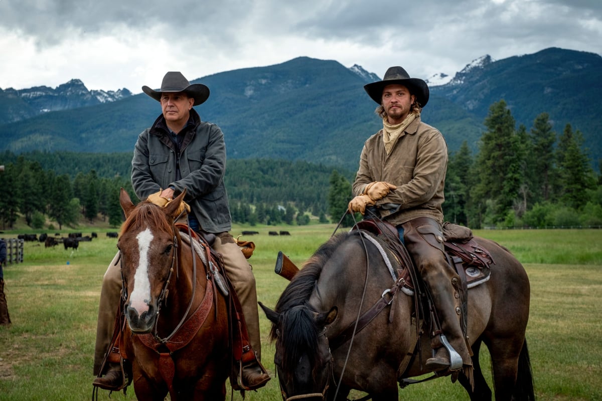 Yellowstone Season 5 stars Kevin Costner (John Dutton) and Luke Grimes (Kayce Dutton) on horses while filming season 3