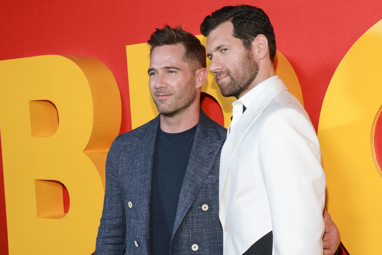 Luke Macfarlane and Billy Eichner pose for a photo at the Bros premiere