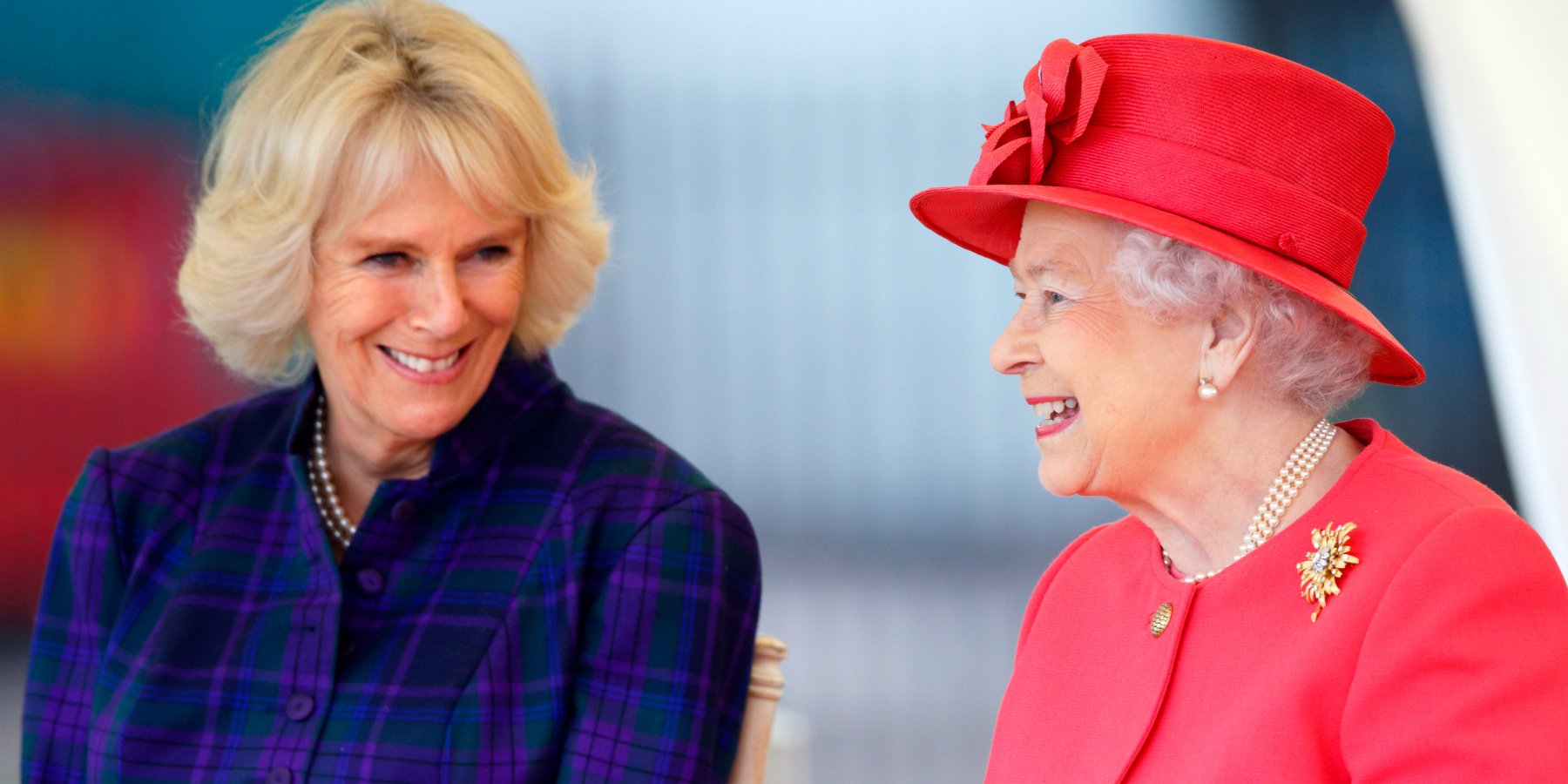 Camilla Parker Bowles and Queen Elizabeth smile in a photograph taken at the Ebony Horse Club and Community Riding Centre on October 29, 2013 in London, England.