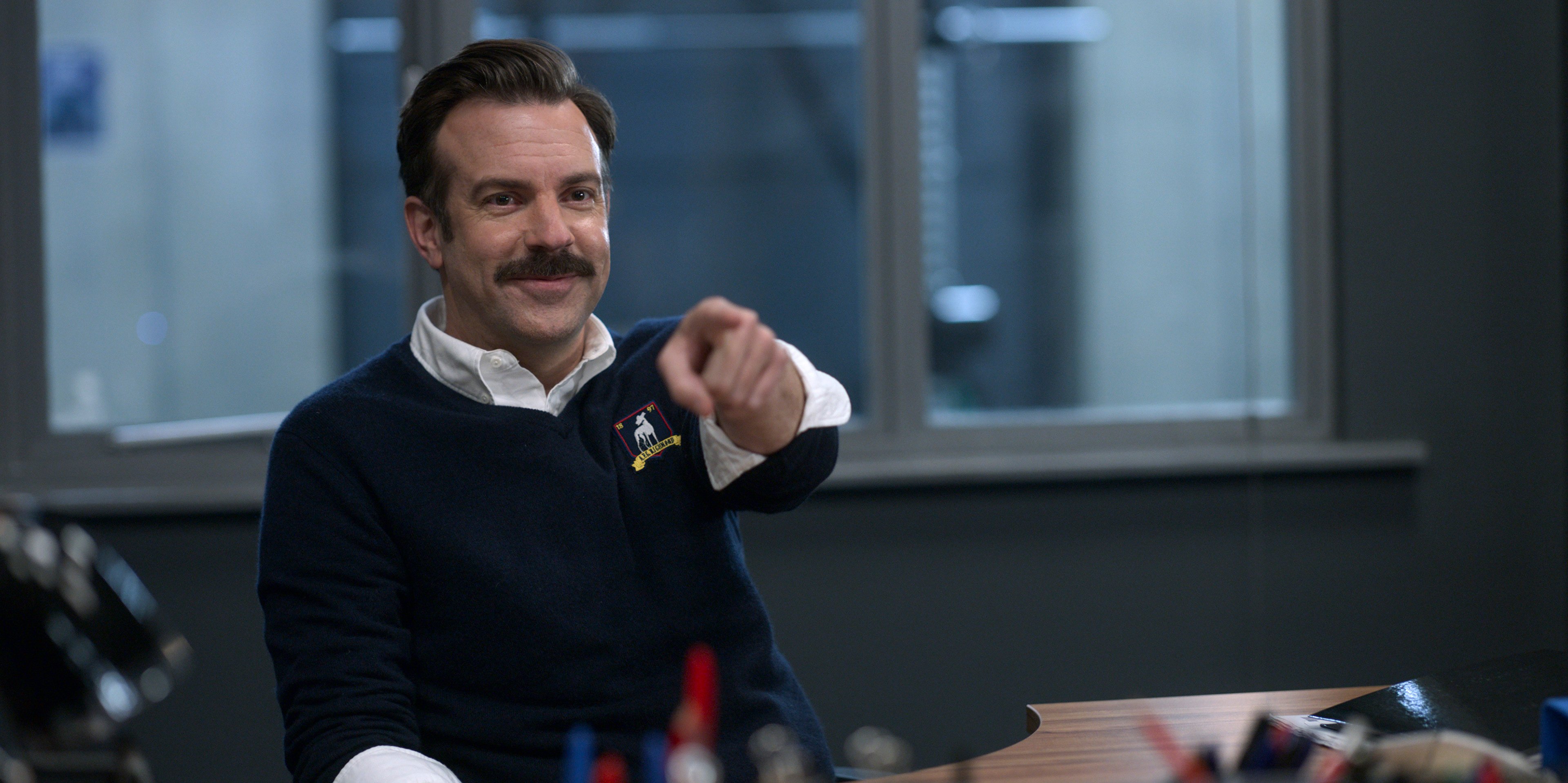 Ted Lasso (Jason Sudeikis) points emphatically in the first season of the Apple TV+ series