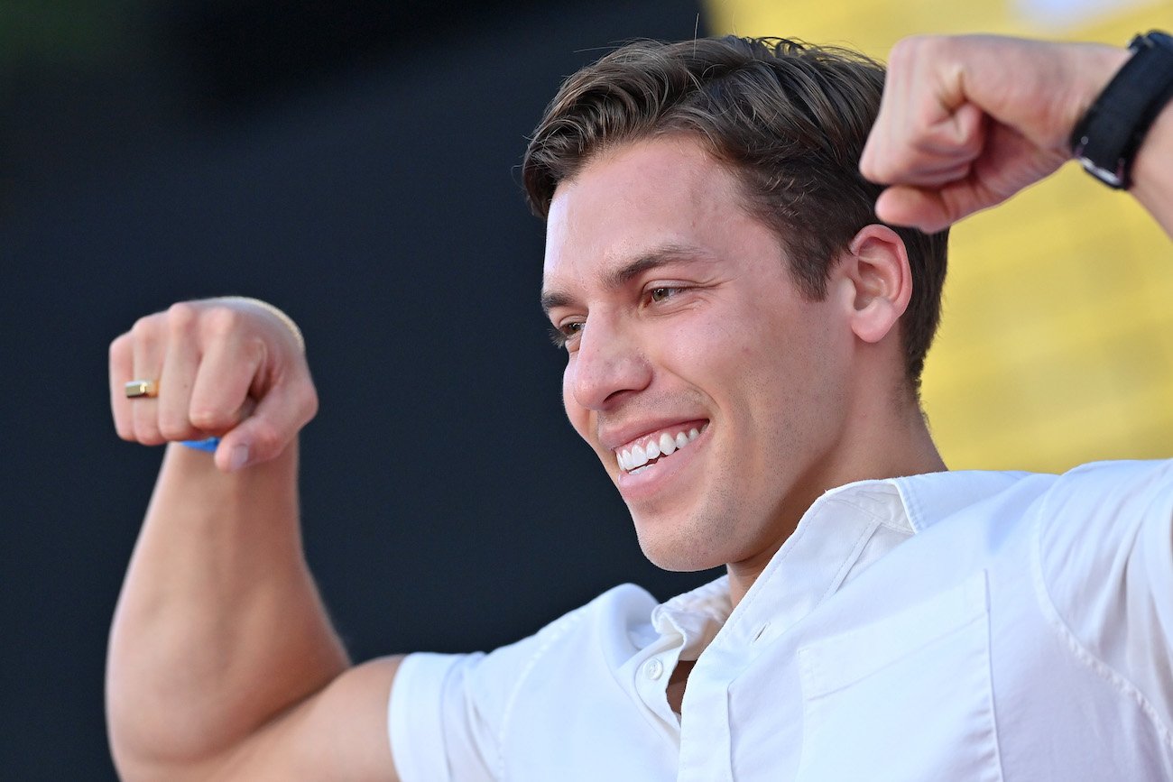 Joseph Baena, Arnold Schwarzenegger and Mildred Baena's son and 'DWTS' Season 31 star, flexing for the camera