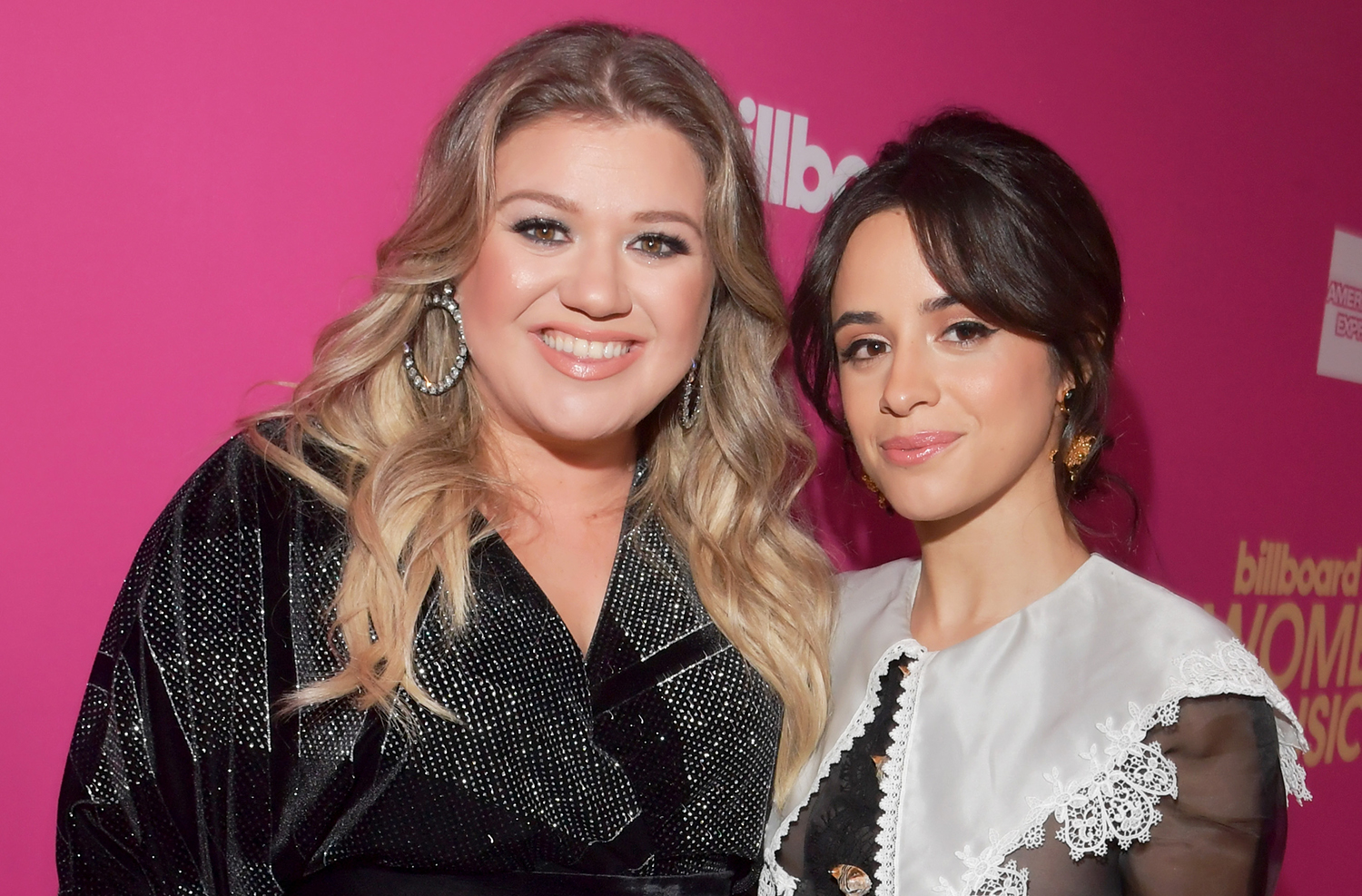 Former The Voice coach Kelly Clarkson and new coach Camila Cabello pose together at Billboard Women In Music 2017