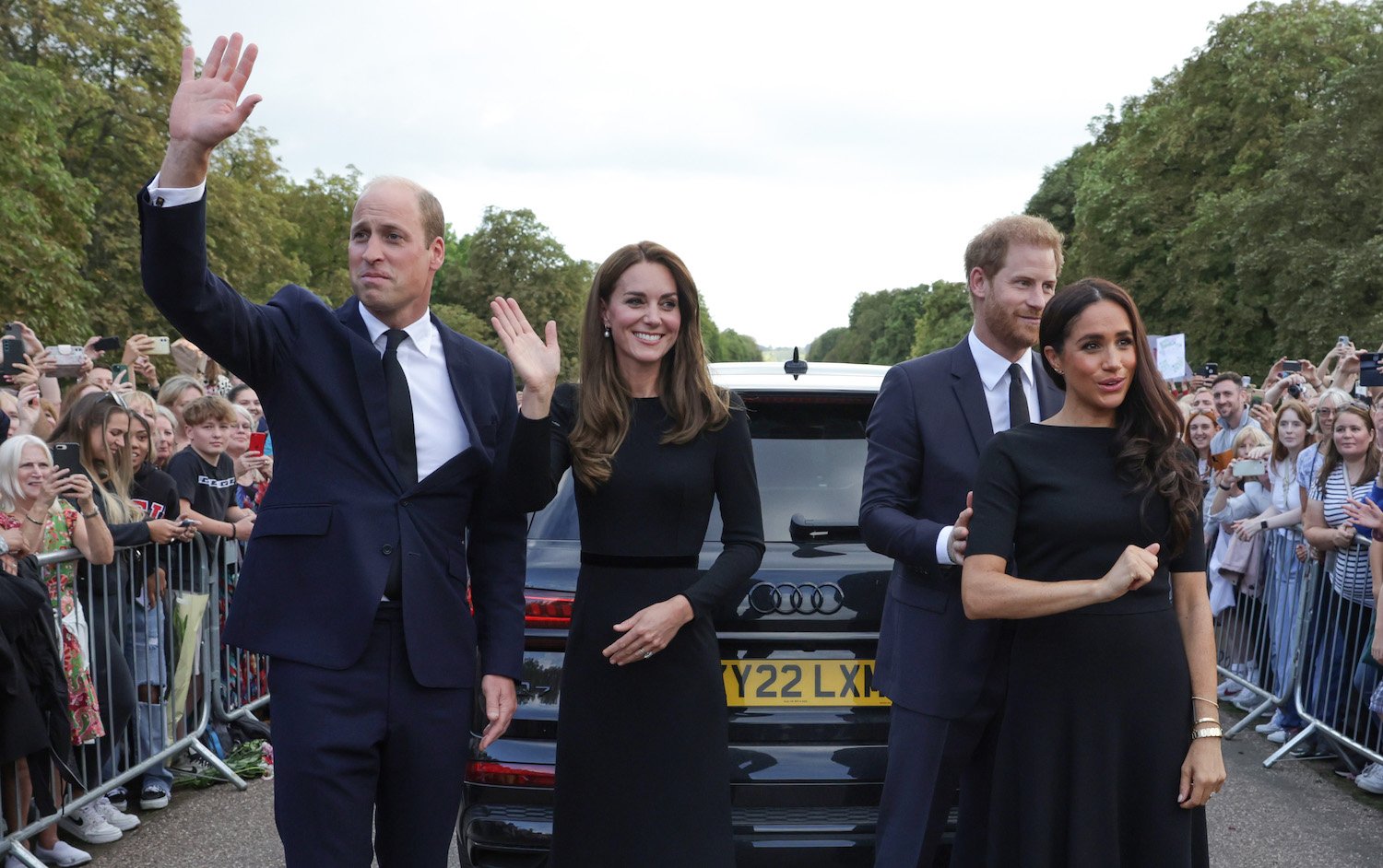 Prince William and Kate Middleton wave outside Windsor Castle after extending olive branch to Prince Harry and Meghan Markle after Queen Elizabeth's death