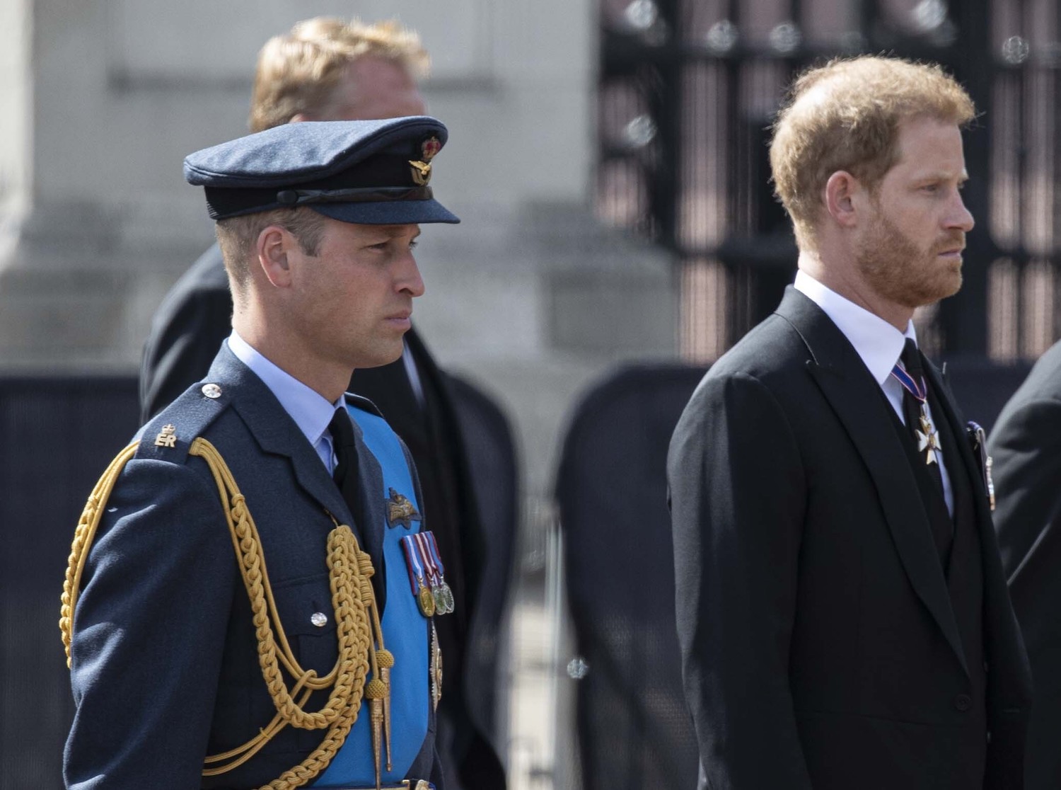 Prince William and Prince Harry walk behind Queen Elizabeth's coffin on their way to Westminster Hall