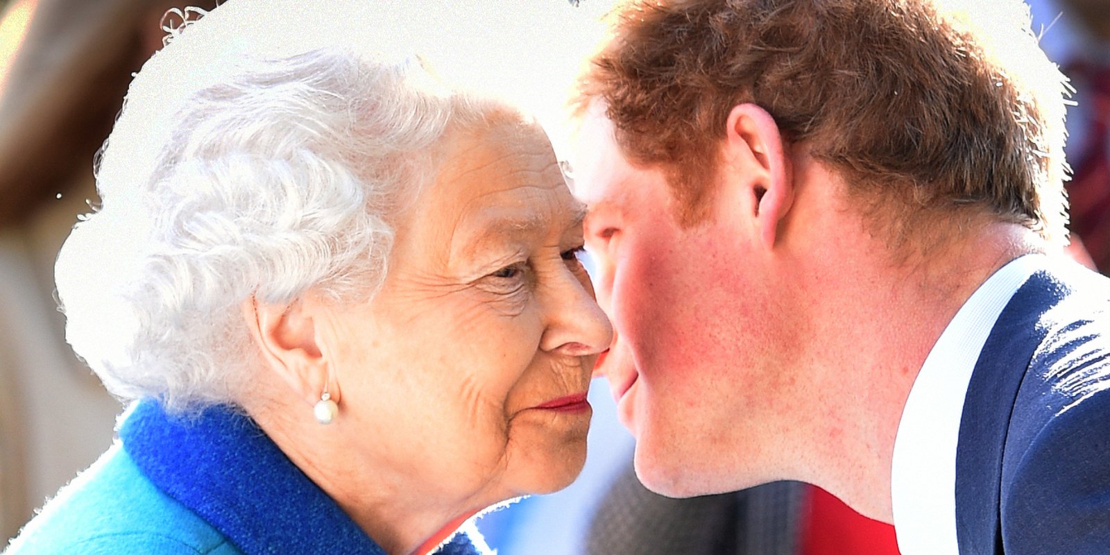 Queen Elizabeth and Prince Harry with their heads close together at Royal Hospital Chelsea on May 18, 2015 in London, England.