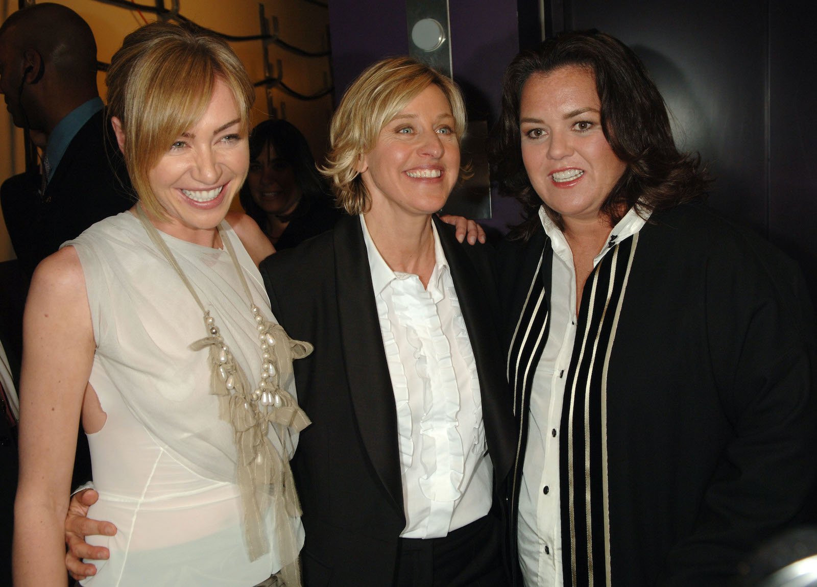 Portia de Rossi, Ellen DeGeneres, and Rosie O'Donnell stand together for a photo