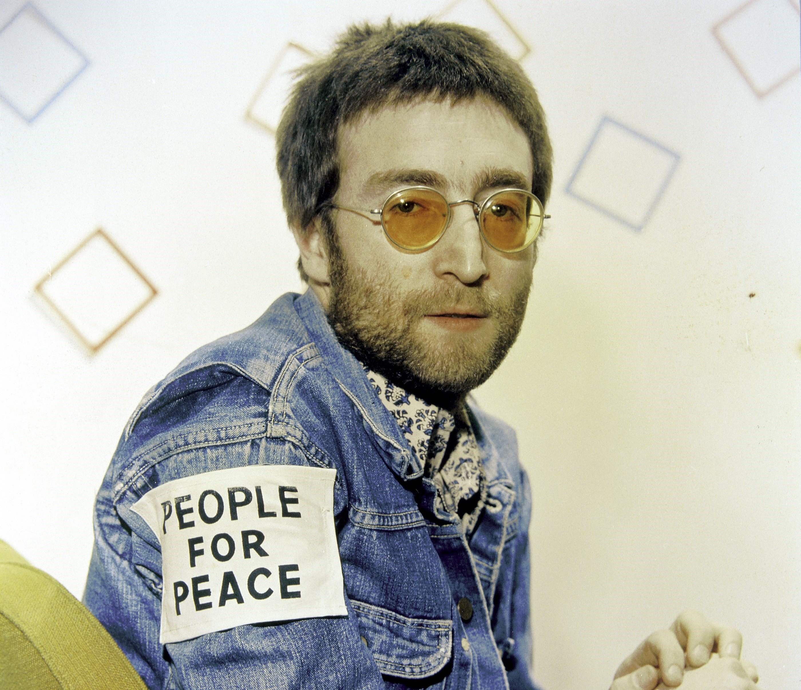 The Beatles' John Lennon wearing blue