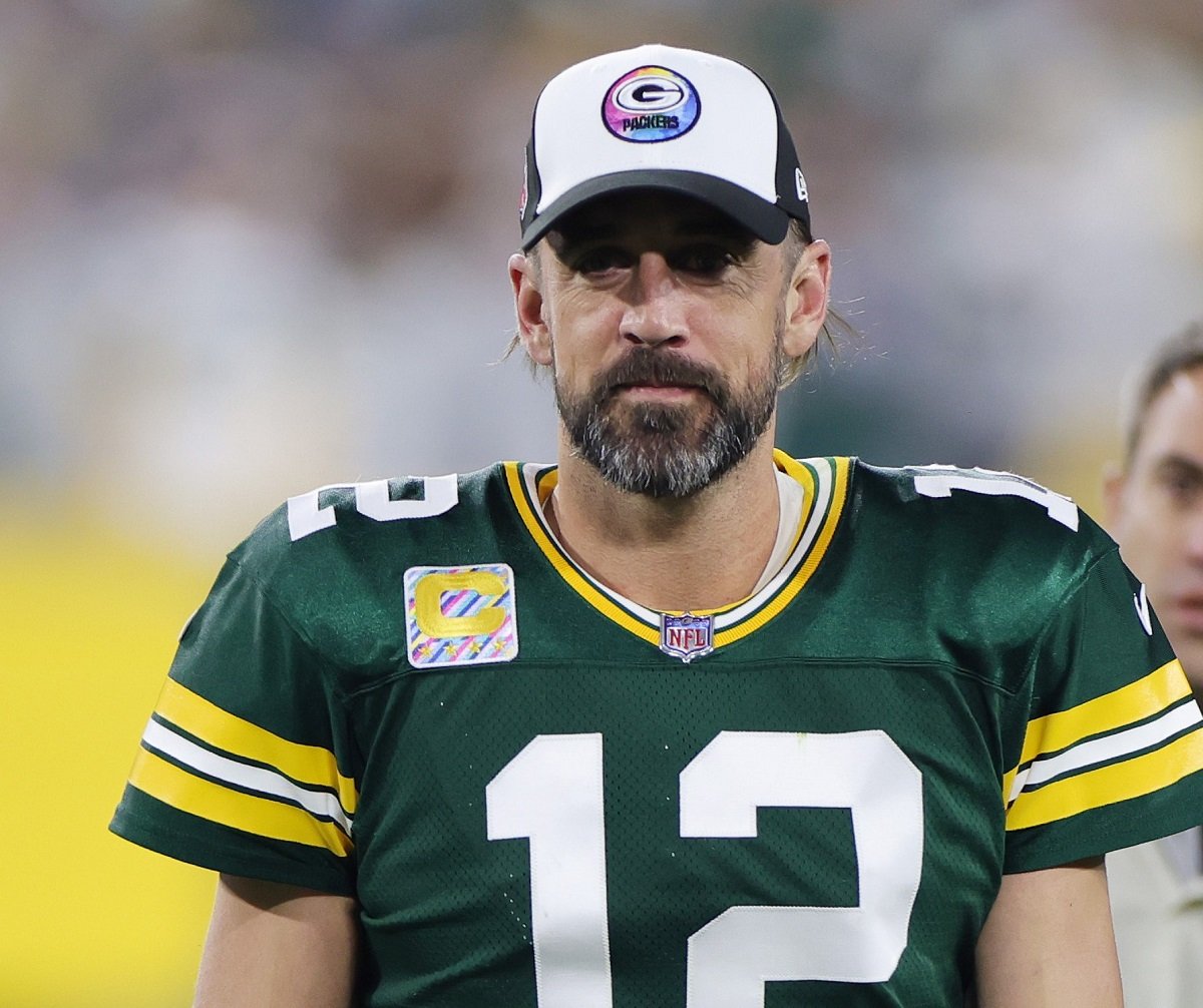 Aaron Rodgers, whose girlfriend's name is Blu, walking off the field after the Green Bay Packers defeat the New England Patriots