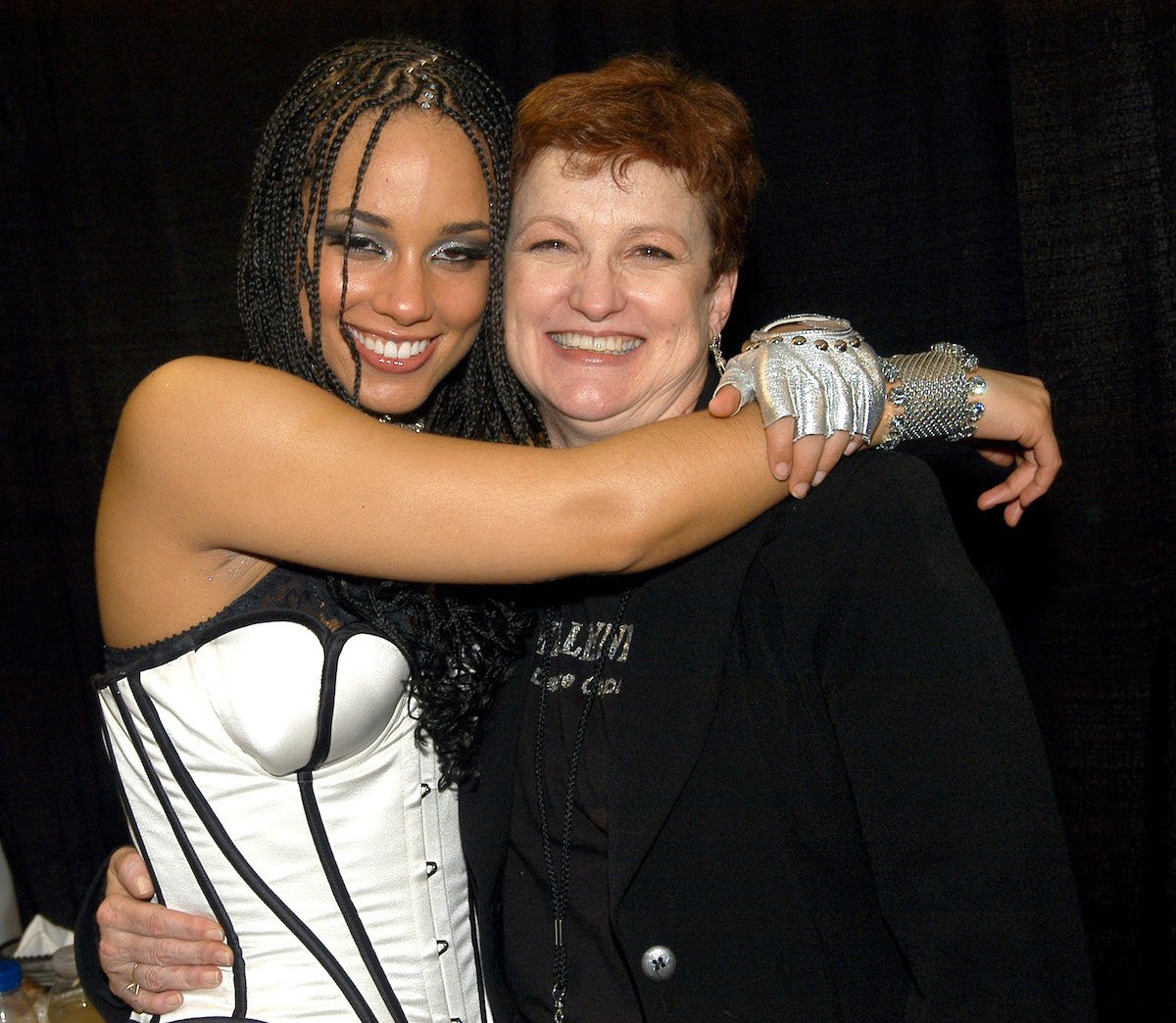Singer Alicia Keys and mother Terri Augello attend a media event together in 2004
