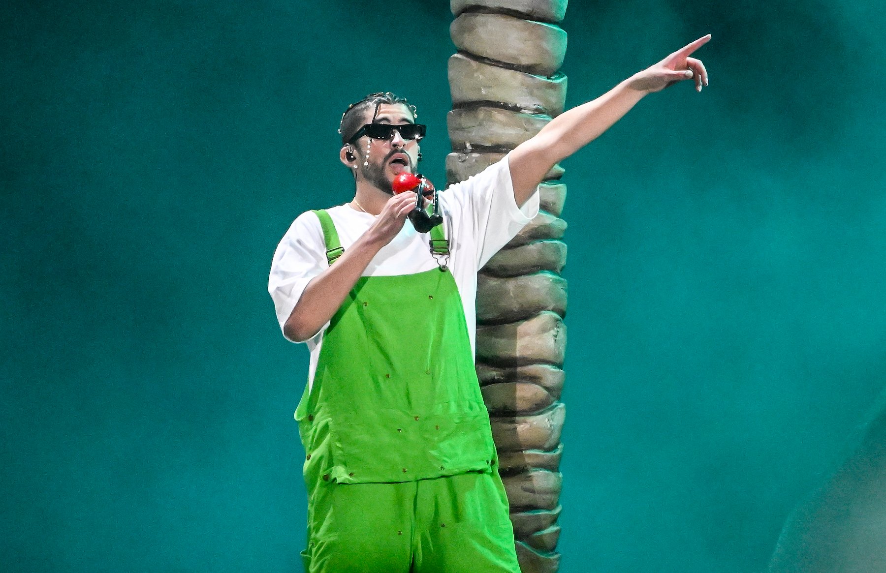 Bad Bunny, wearing green overalls