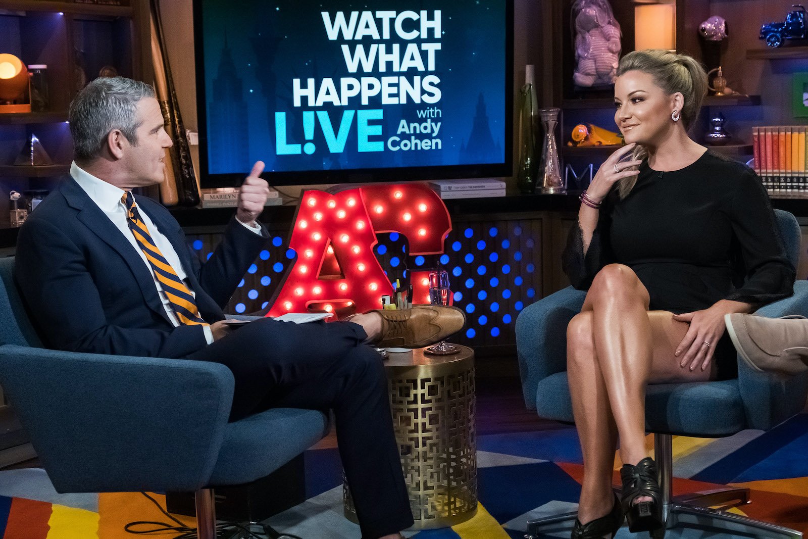 Andy Cohen sits next to Hannah Ferrier from 'Below Deck Med' at the WWHL Clubhouse