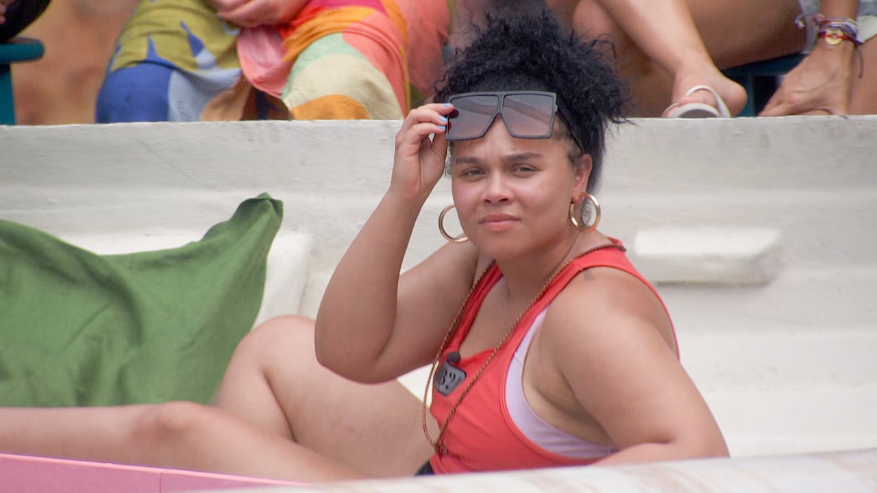 Jasmine Davis looks back and lifts her sunglasses on 'Big Brother 24'.