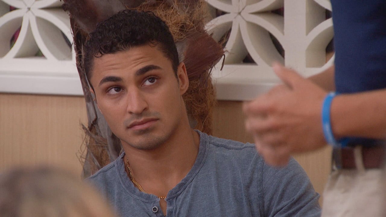 Joseph Abdin sits in the 'Big Brother 24' living room looking up at Pooch.