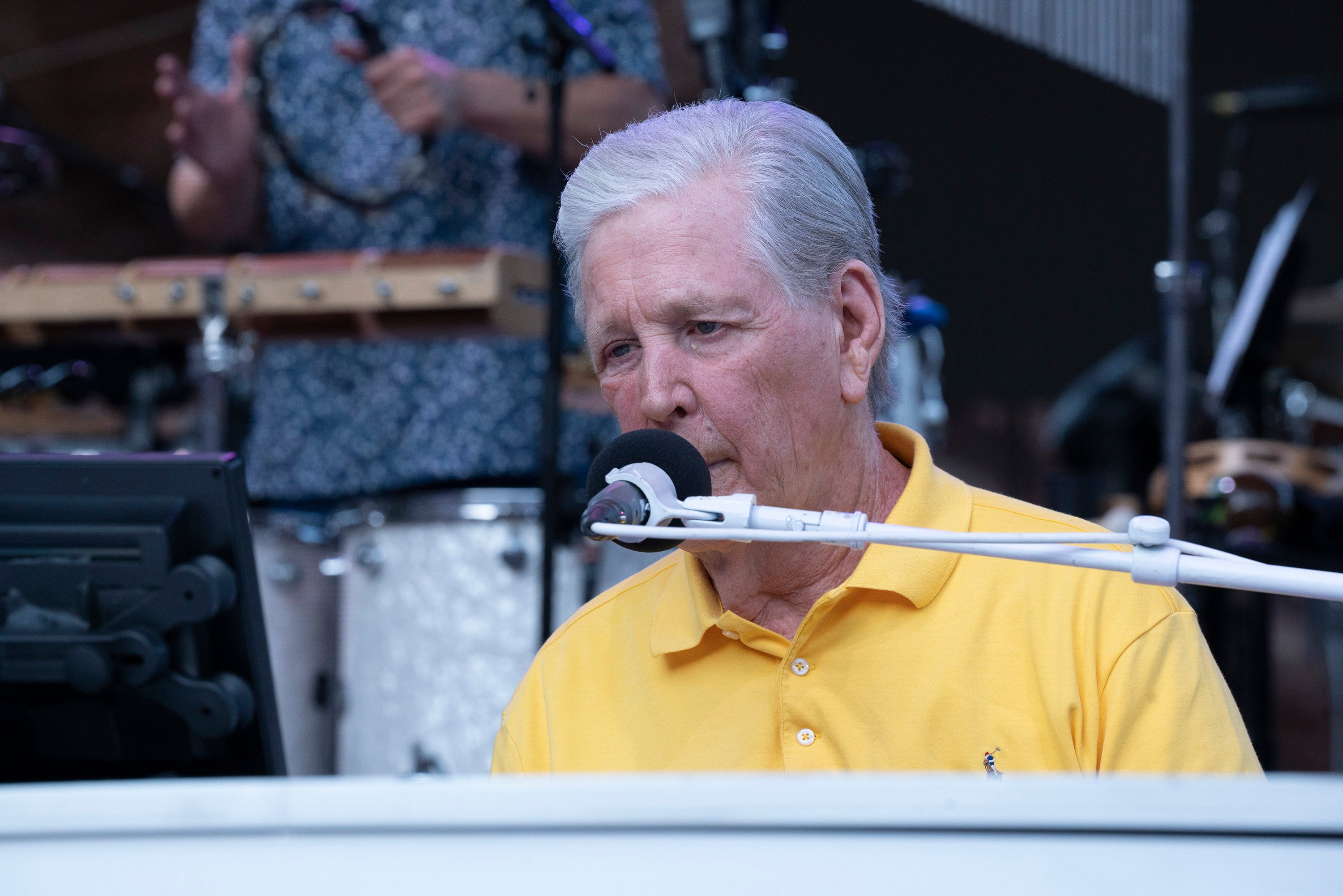 Brian Wilson is performing Beach Boys songs at the Red Rocks Amplitheater