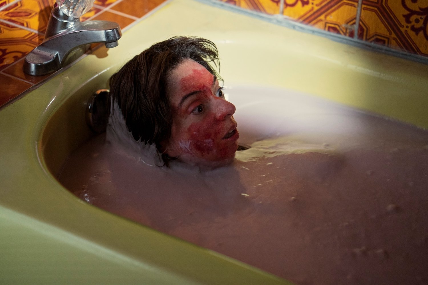 'Cabinet of Curiosities' episode 'The Outside' stars Kate Micucci as Stacey, seen her soaking in a tub filled with lotion.
