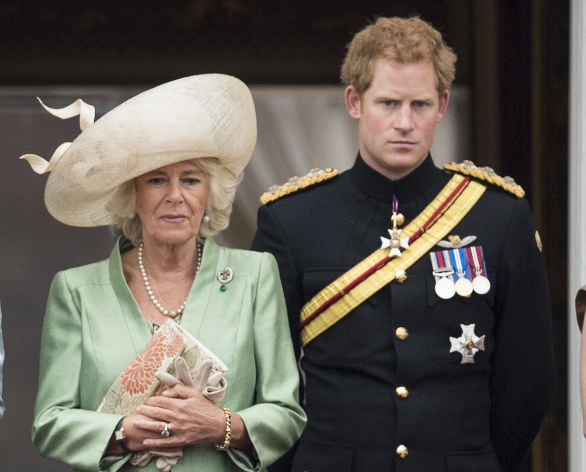 Camilla Parker Bowles and Prince Harry standing on the balcony during the annual Trooping The Colour ceremony