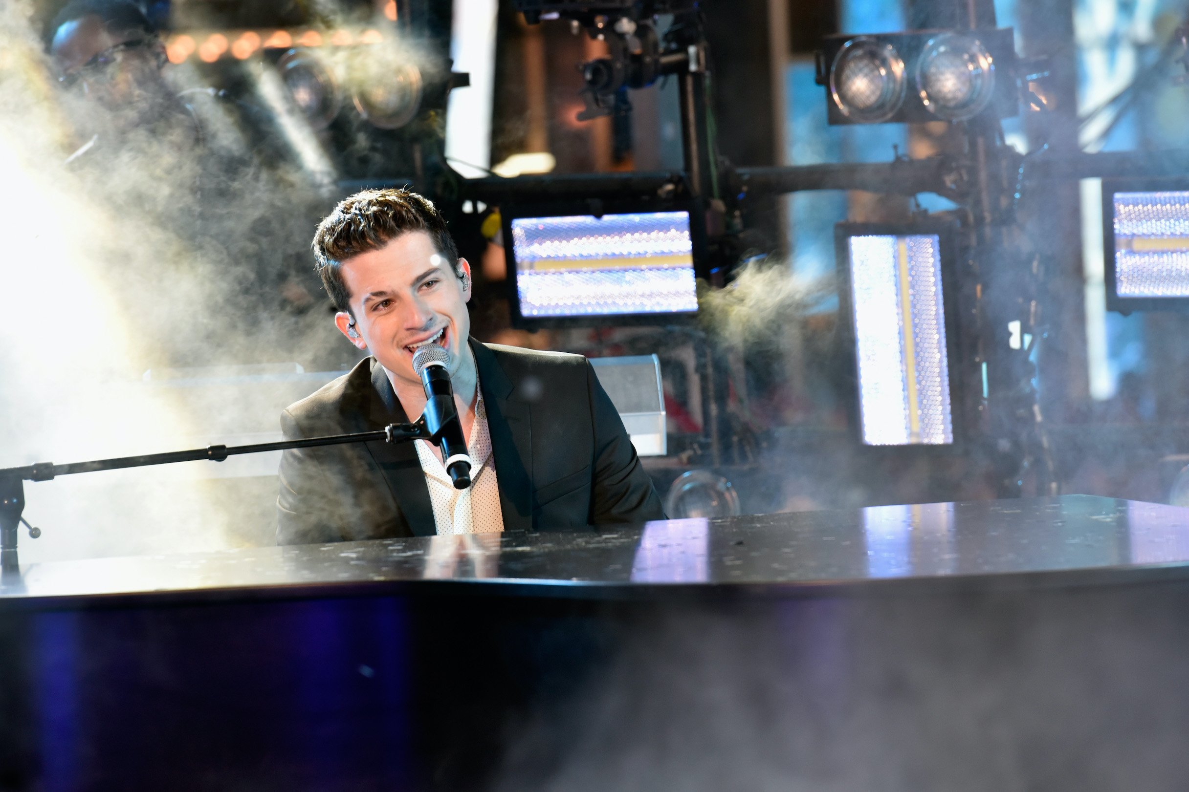 Charlie Puth performs See You Again with Wiz Khalifa at 2016's New Year's Eve celebration at Times Square
