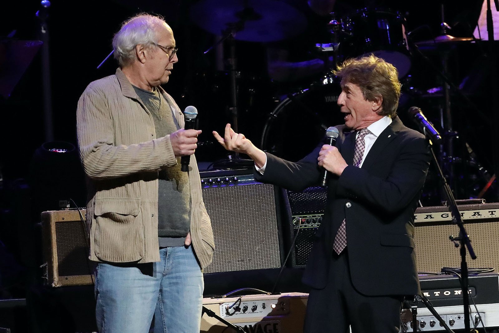 Chevy Chase and Martin Short perform together on stage