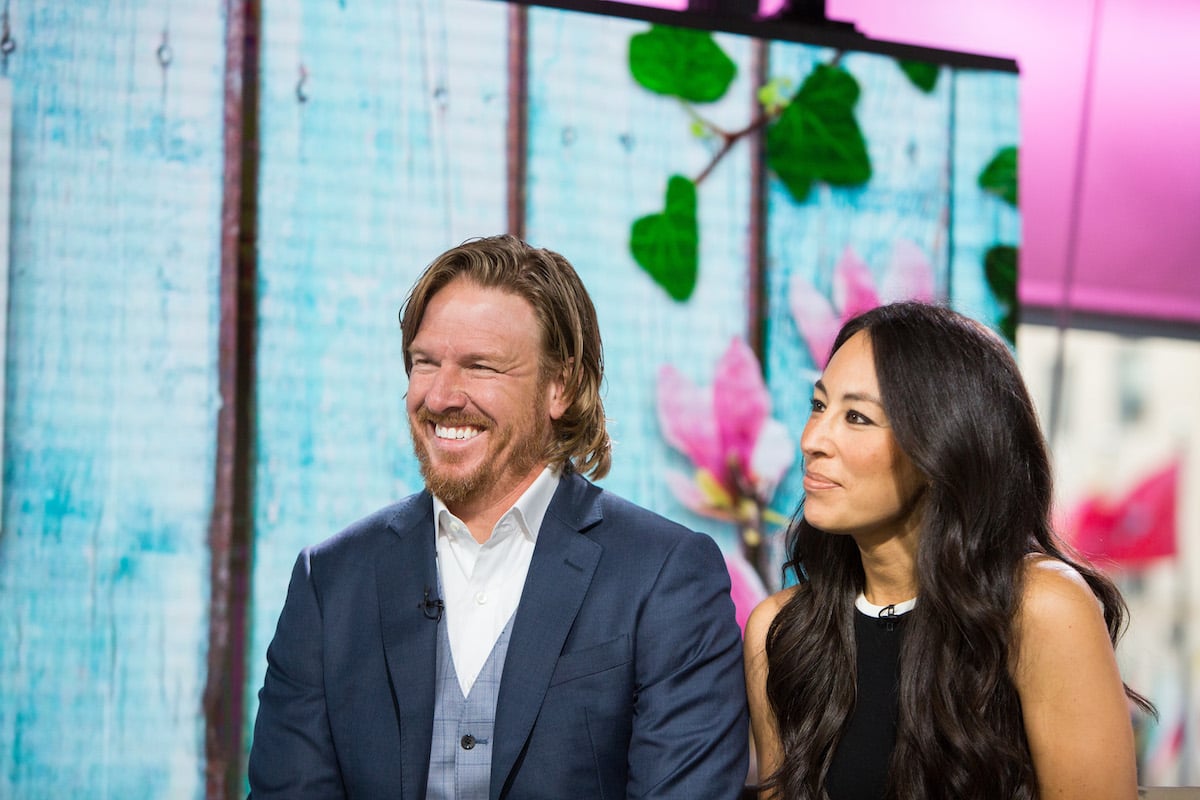 Chip Gaines and Joanna Gaines smiling during an interview