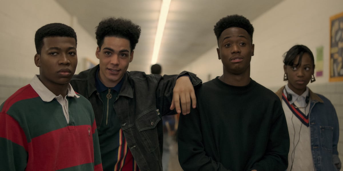 Mekai Curtis as Kanan, Antonio Ortiz as Famous, Nile Bullock as D-Wiz and Hailey Kilgore as Jukebox standing in the halls of their high school in 'Power Book III: Raising Kanan'