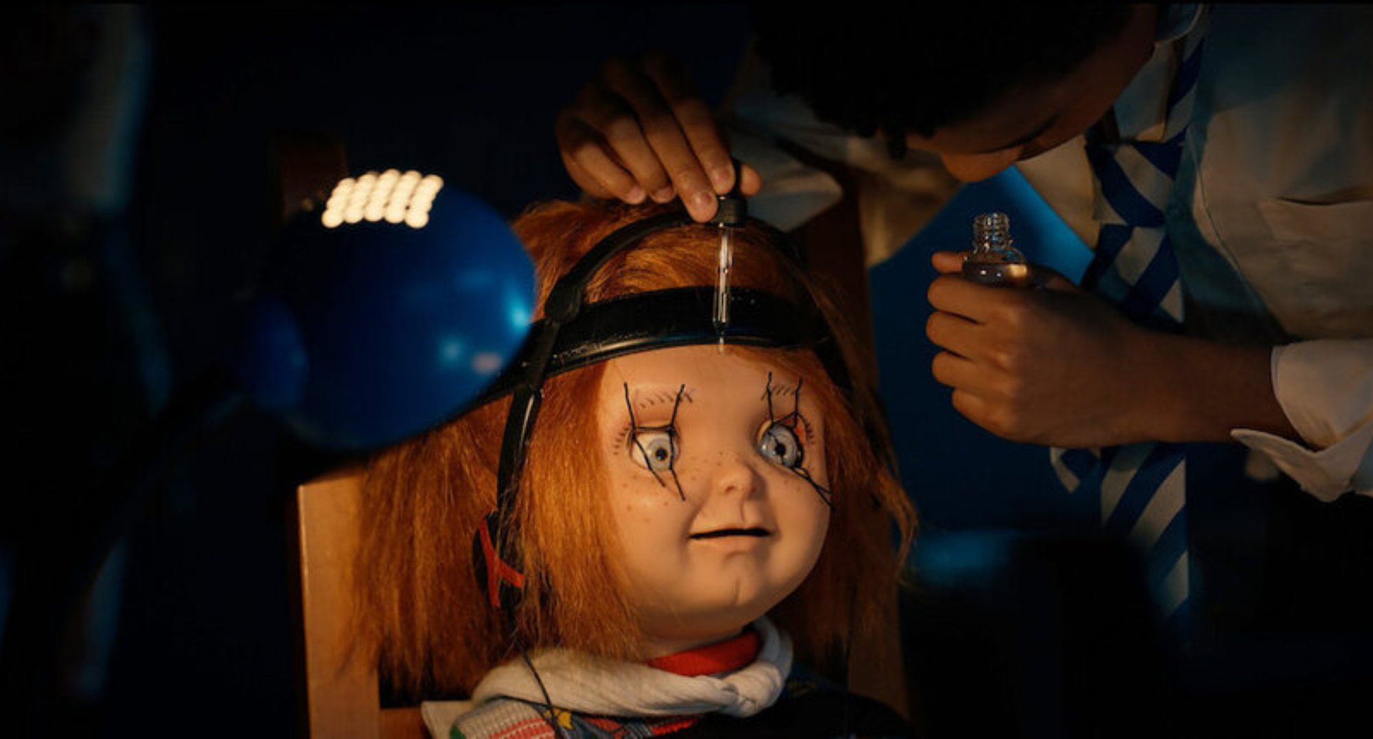 Devon and Chucky in 'Chucky' Season 2, Episode 3 in 'A Clockwork Orange' scene.