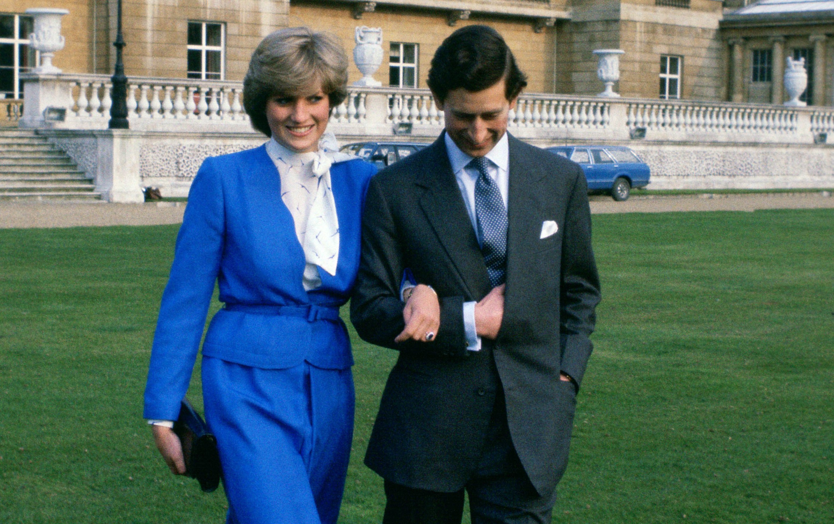 Prince Charles (later to become King Charles III) and Lady Diana Spencer (later to become Princess Diana) in the gardens of Buckingham Palace on the day of announcing their engagement.