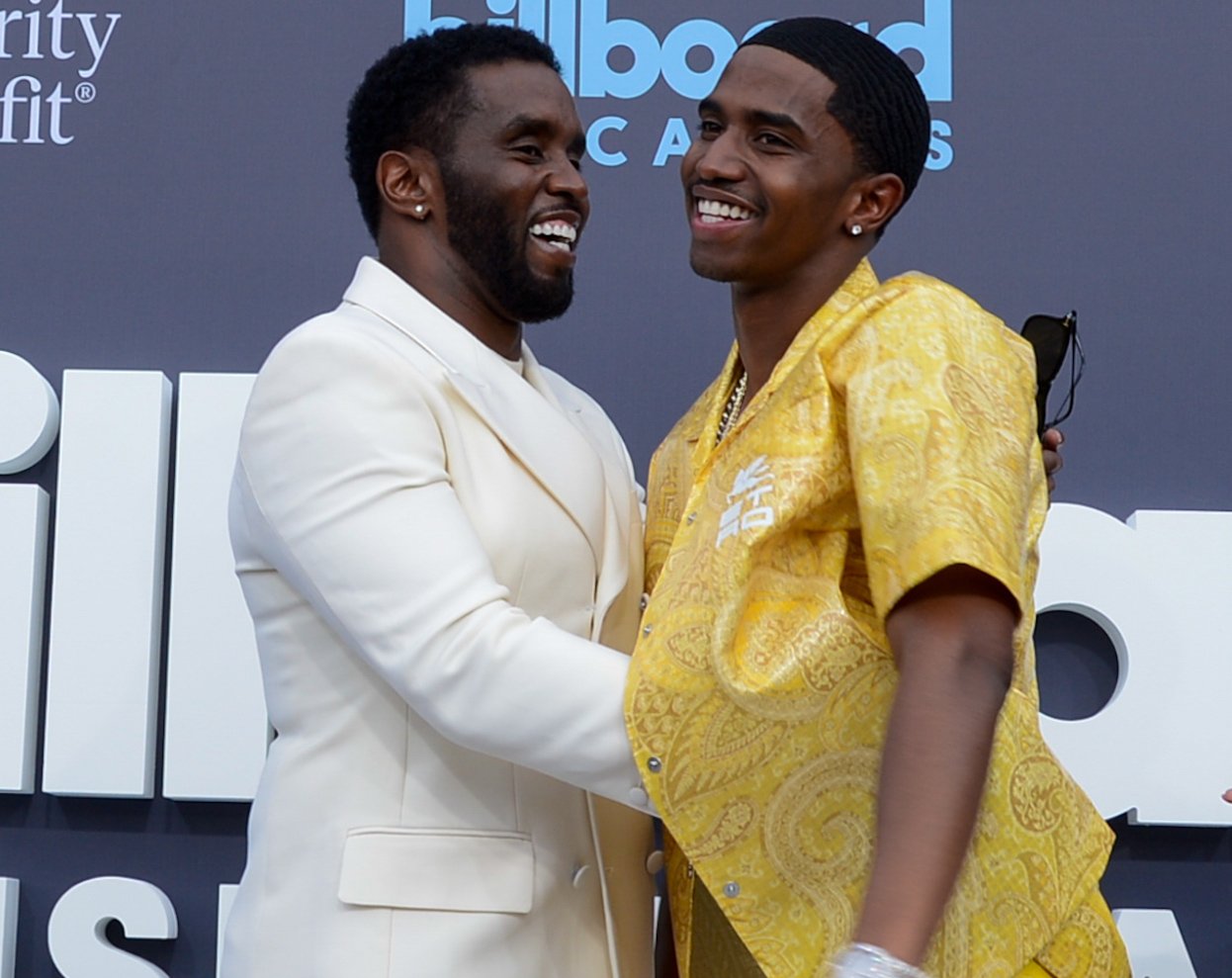 Diddy and King Combs have a moment together on the red carpet; Diddy and King Combs made Billboard chart history